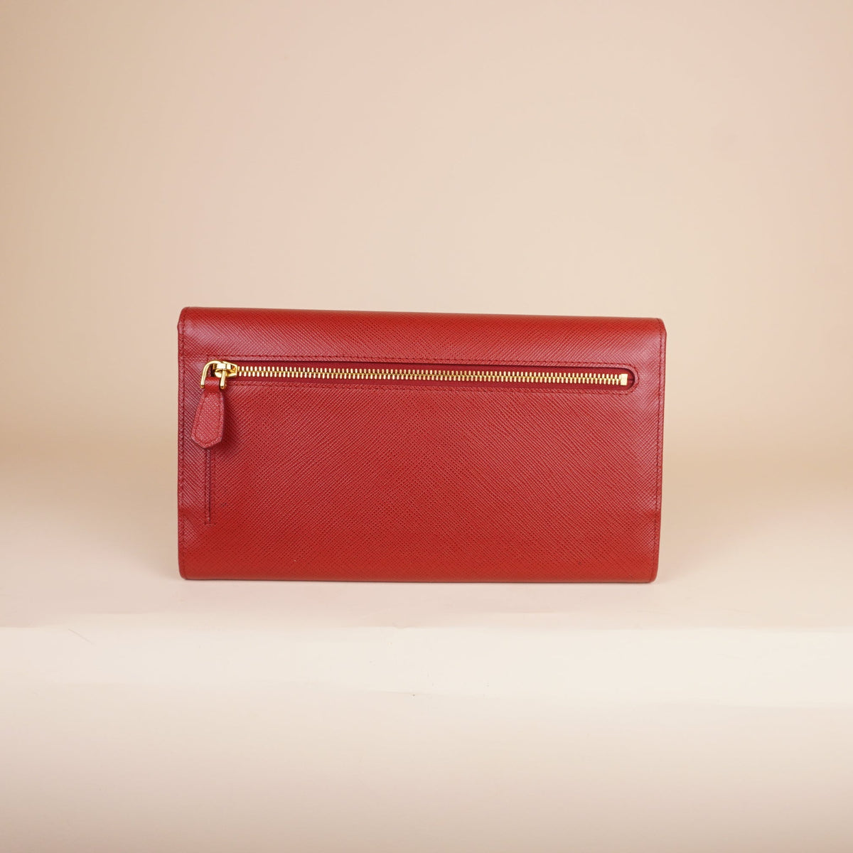 PRE-OWNED Saffiano Metal Continental Flap Wallet Peonia