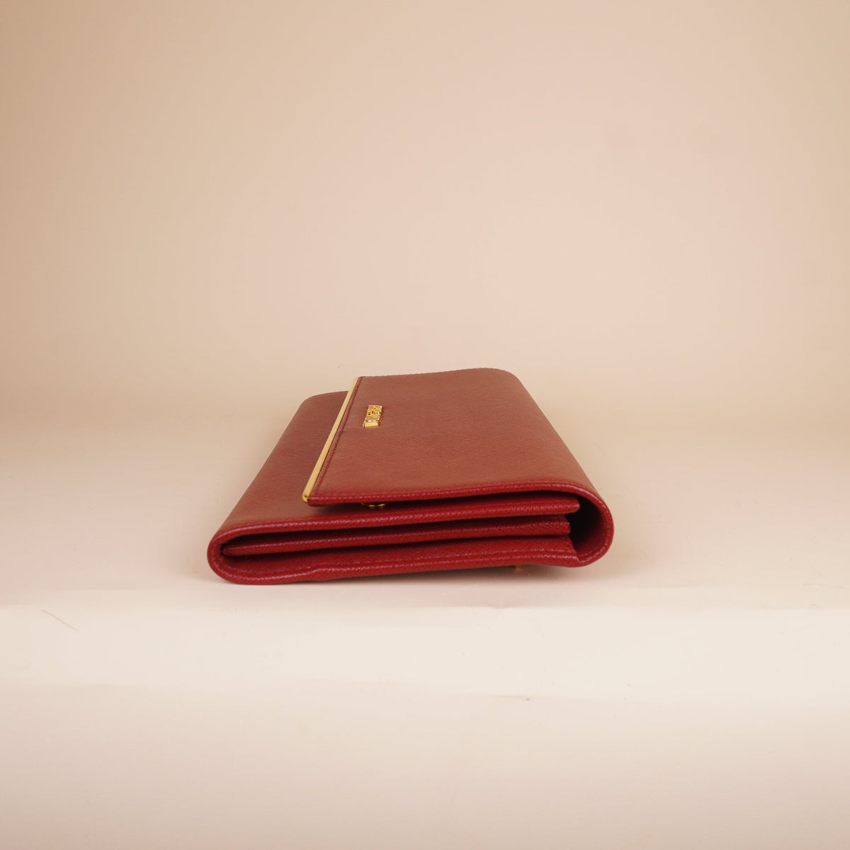 PRE-OWNED Saffiano Metal Continental Flap Wallet Peonia