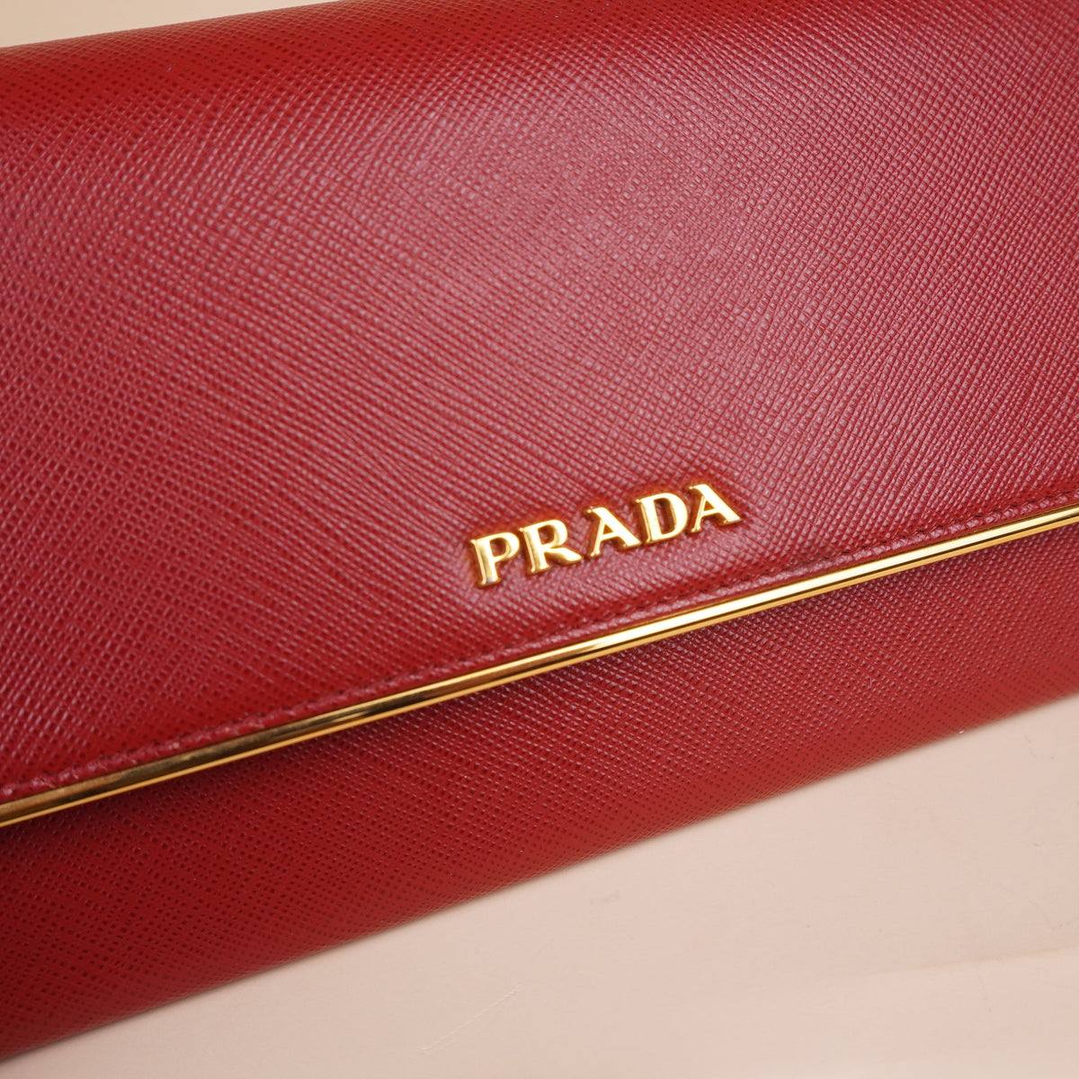 PRE-OWNED Saffiano Metal Continental Flap Wallet Peonia