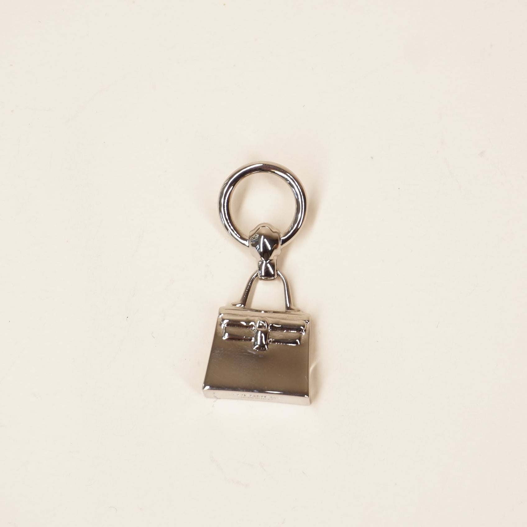 PRE-OWNED Mini Kelly Twilly scarf ring Silver Hardware