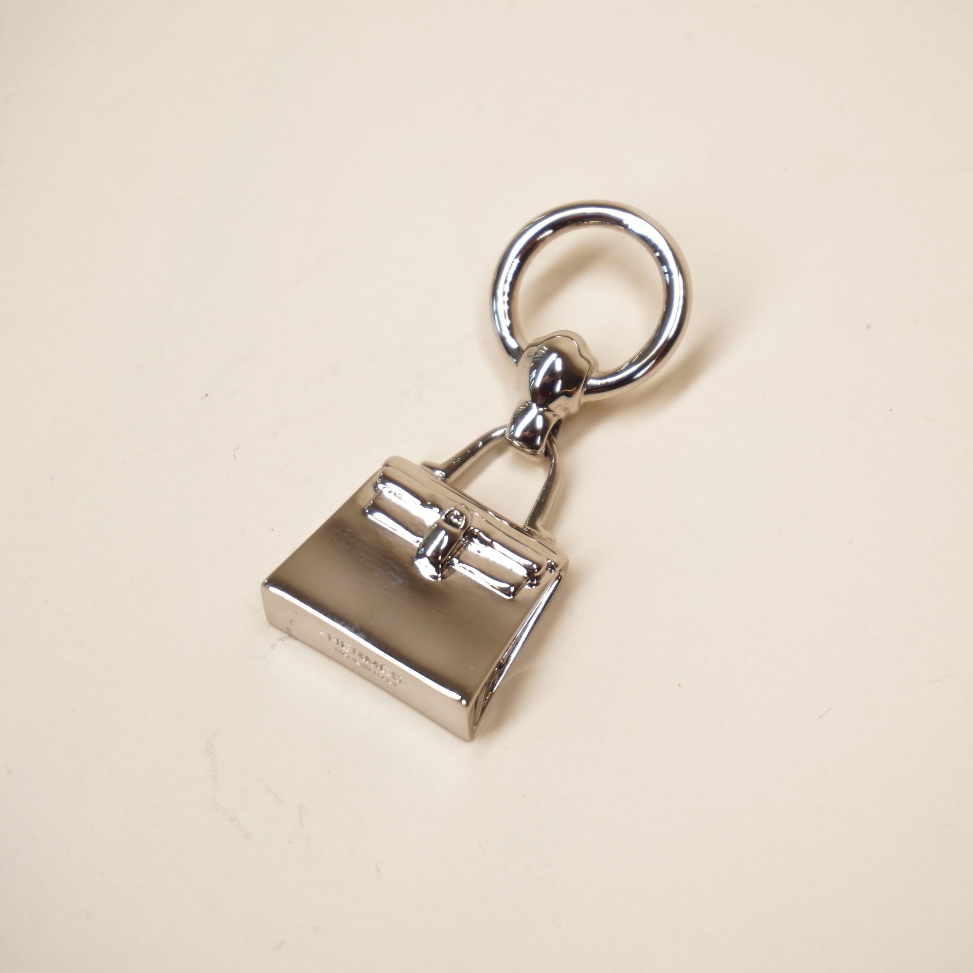 PRE-OWNED Mini Kelly Twilly scarf ring Silver Hardware