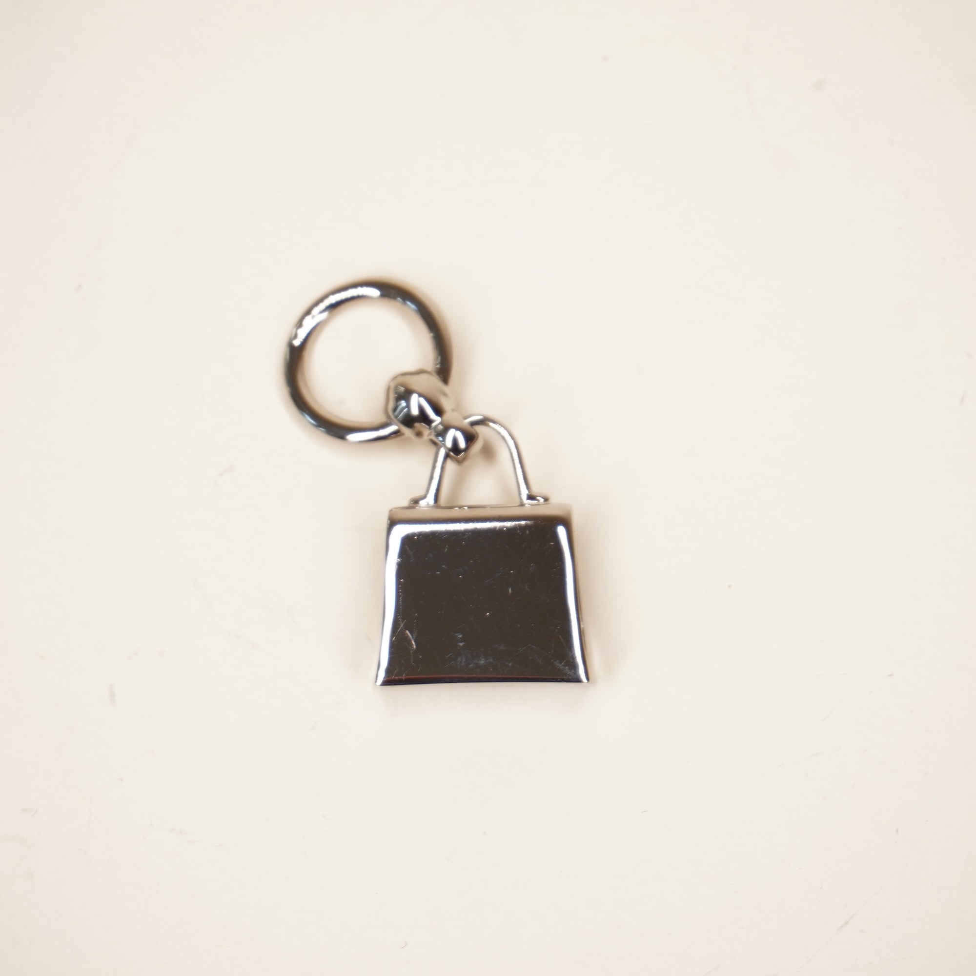 PRE-OWNED Mini Kelly Twilly scarf ring Silver Hardware