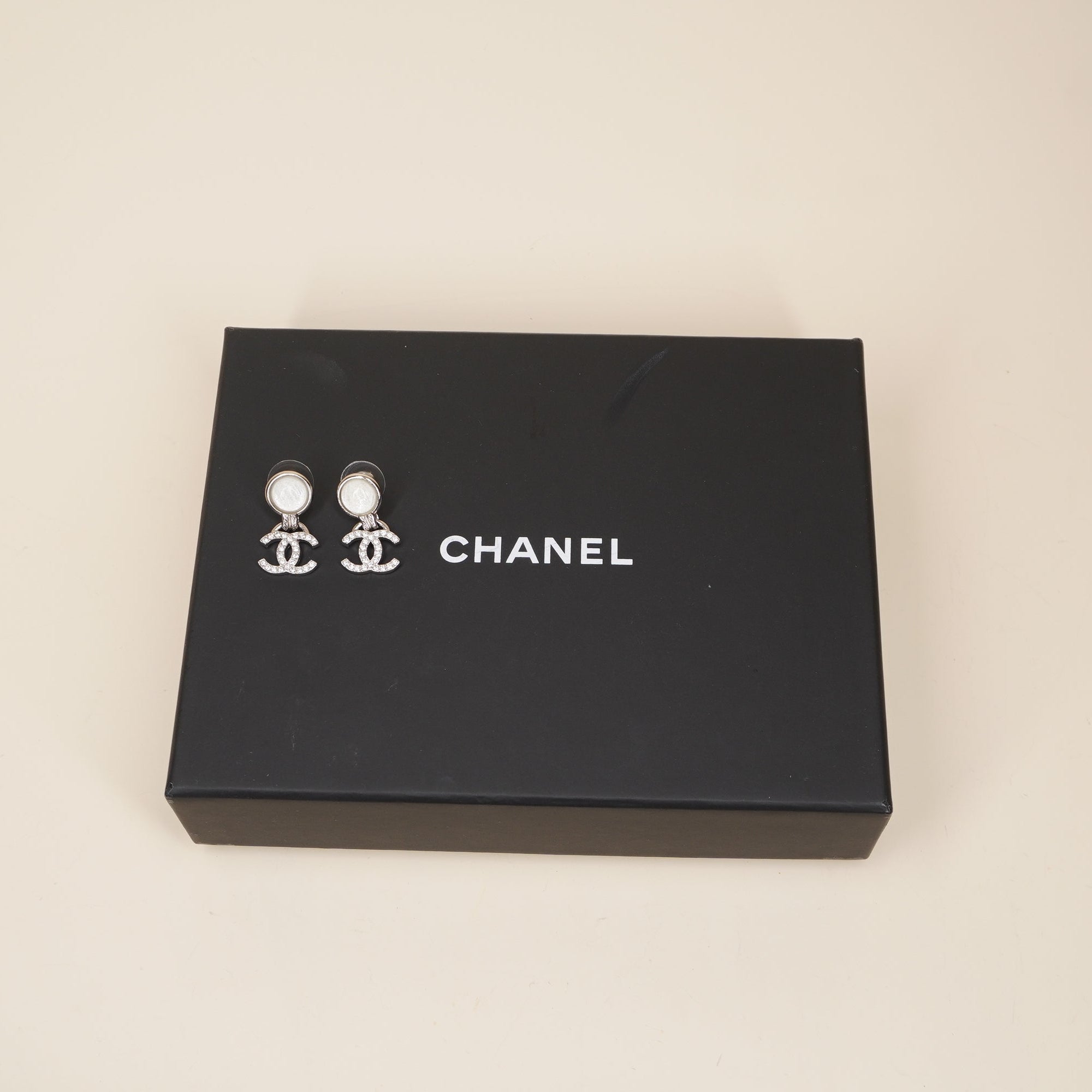 PRE-OWNED CC Cocomark Drop Earrings Silver Clear