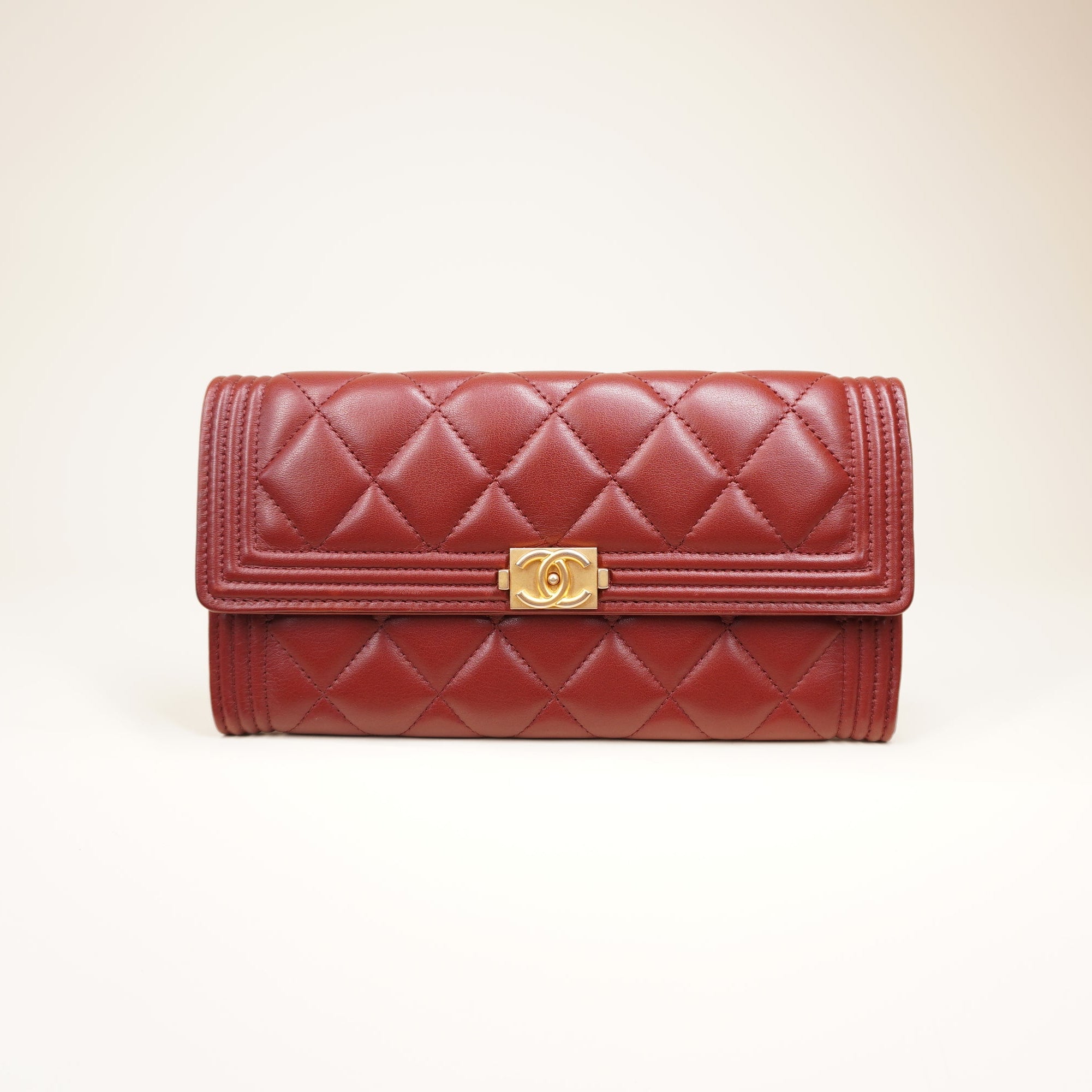 PRE-OWNED CC Burgundy Caviar Quilted Large Boy Gusset Flap Wallet