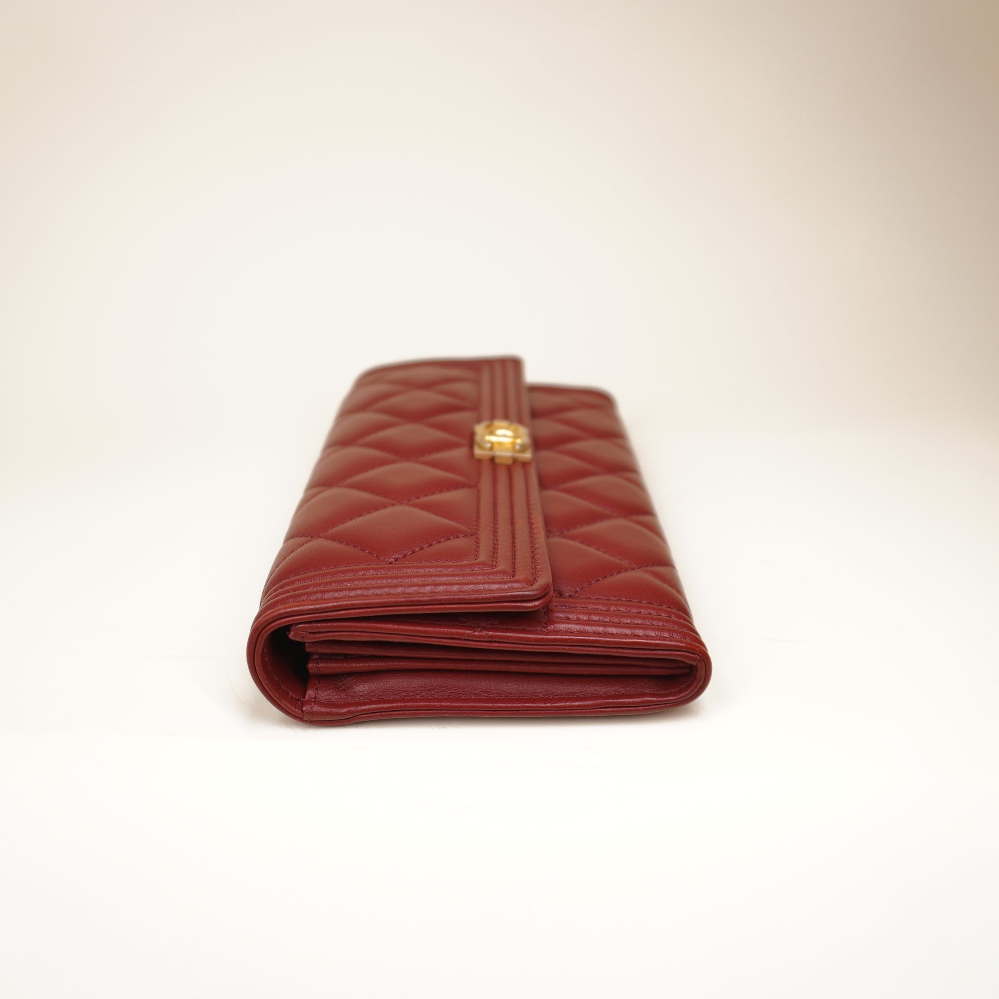 PRE-OWNED CC Burgundy Caviar Quilted Large Boy Gusset Flap Wallet