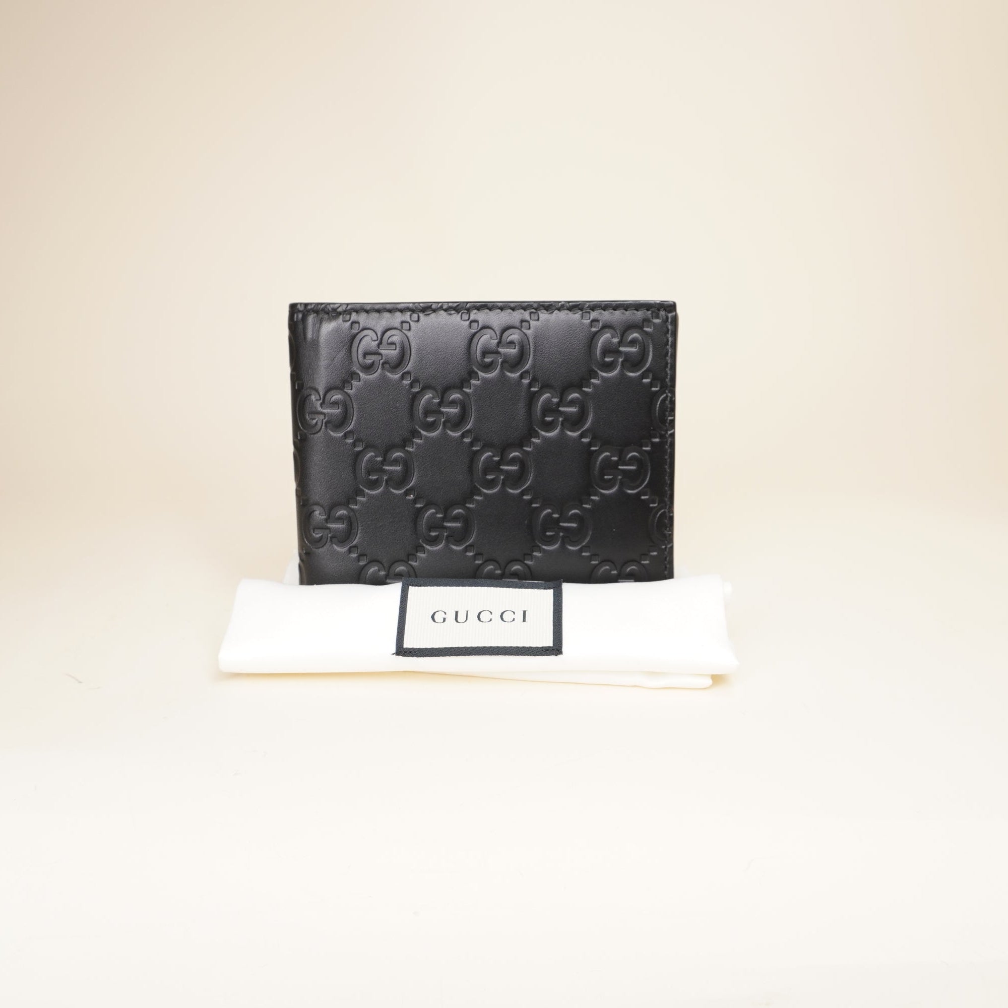 PRE-OWNED GG Emblem Bi-Fold Black Wallet