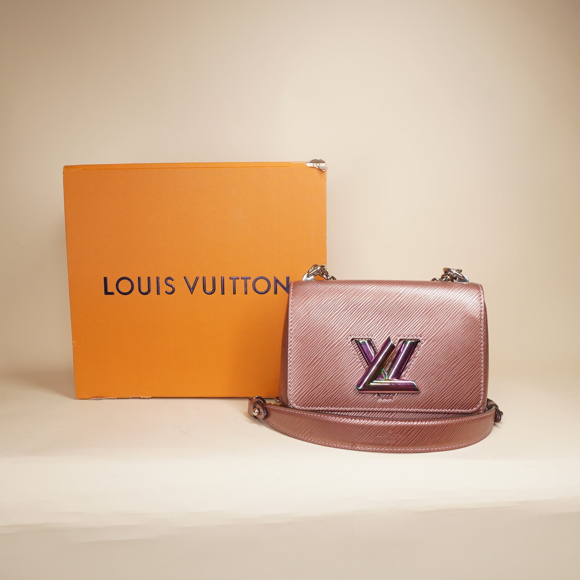 PRE-OWNED LV Metallic Pink Epi Leather Twist PM Crossbody Bag