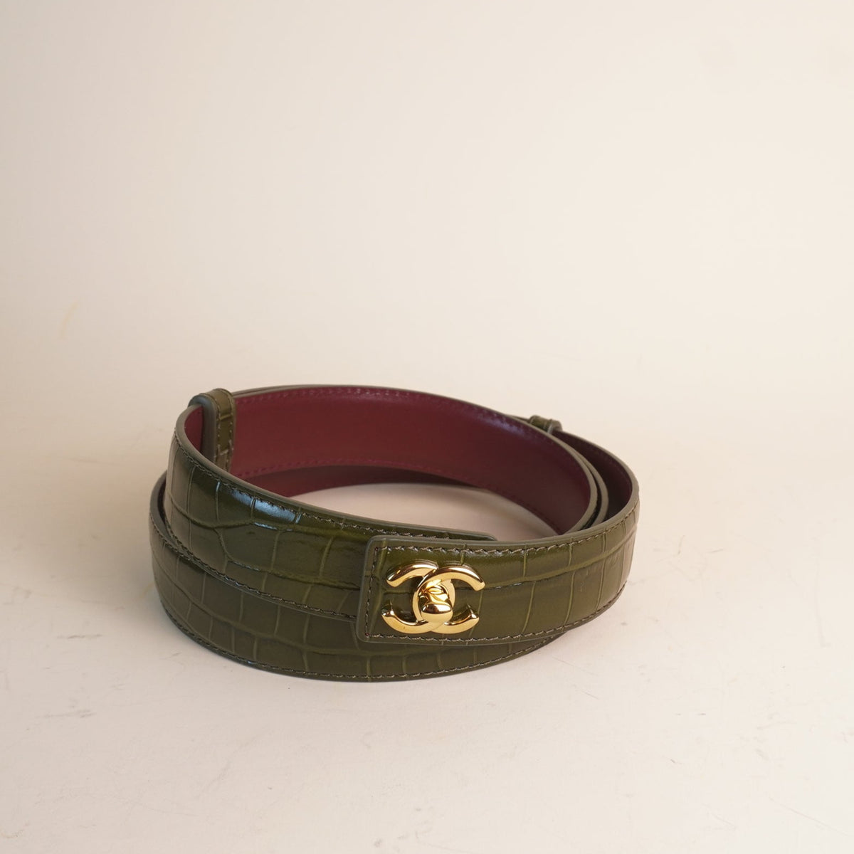 PRE-OWNED CC Crocodile Embossed Calfskin & Metal Green Belt