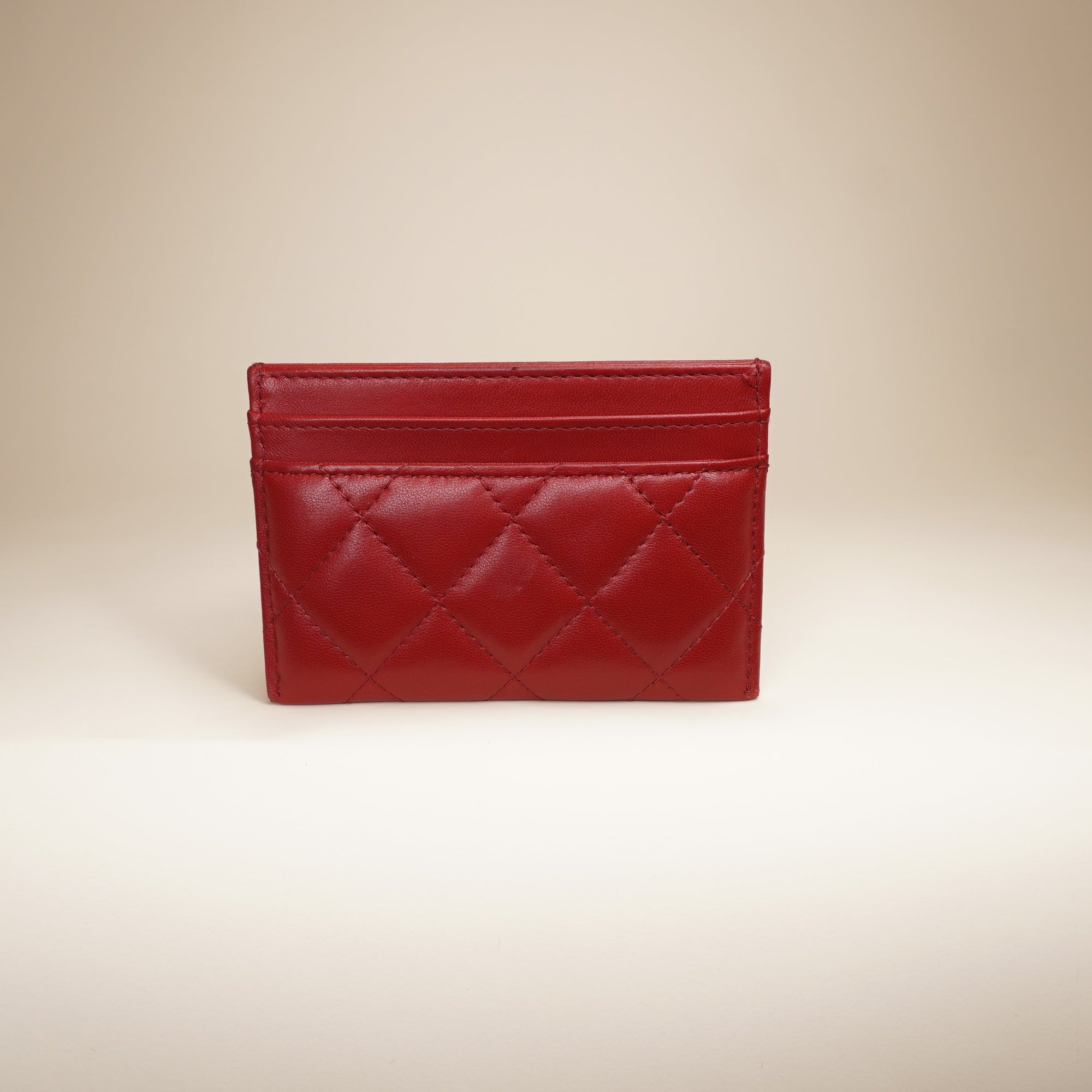 PRE-OWNED CC Lambskin Quilted Card Holder Red