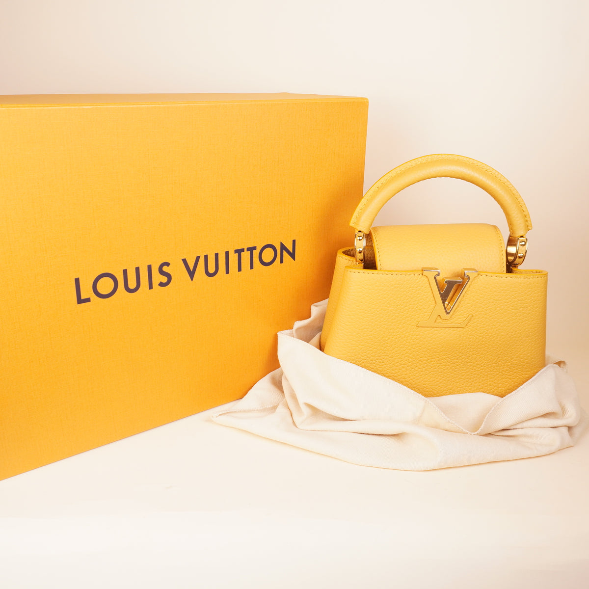 PRE-OWNED LV Capucines Mini Yellow Leather Shoulder Bag