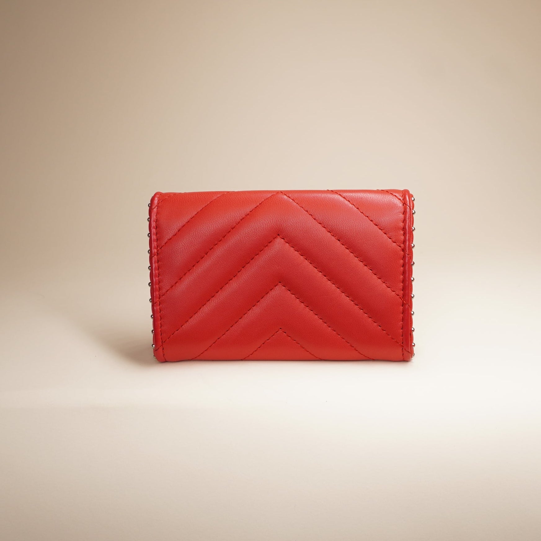 PRE-OWNED CC Red Studded Compact Flap Wallet