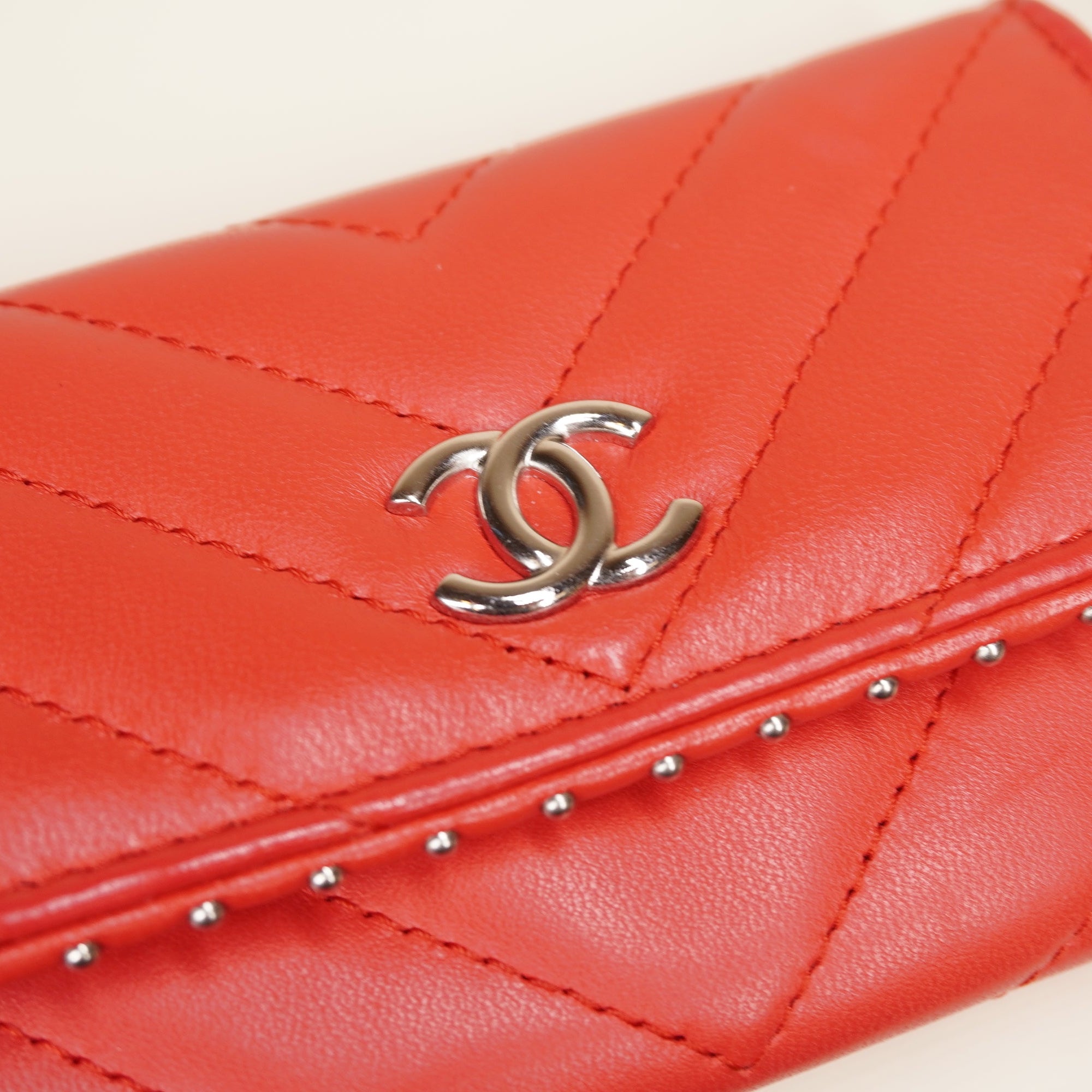 PRE-OWNED CC Red Studded Compact Flap Wallet