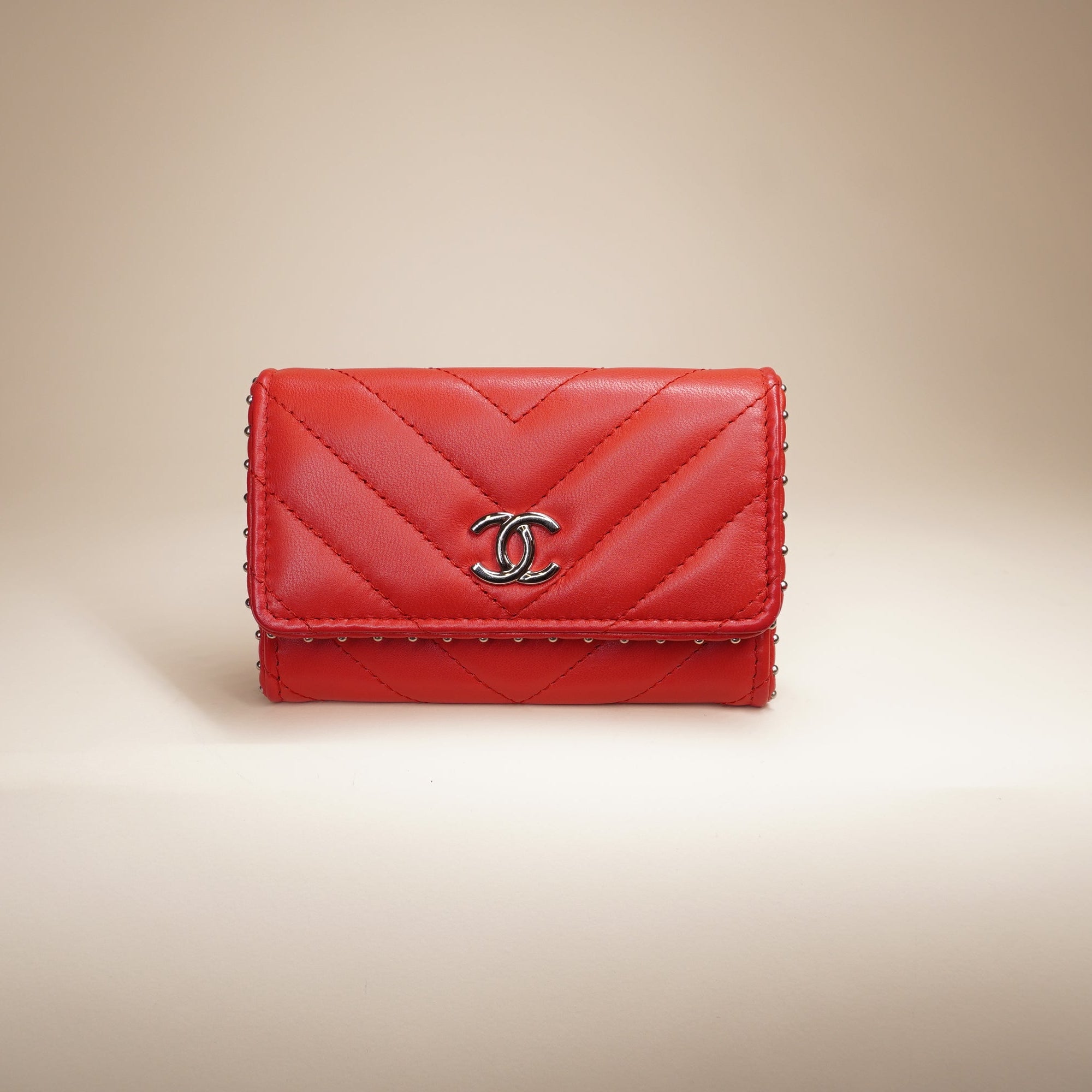 PRE-OWNED CC Red Studded Compact Flap Wallet