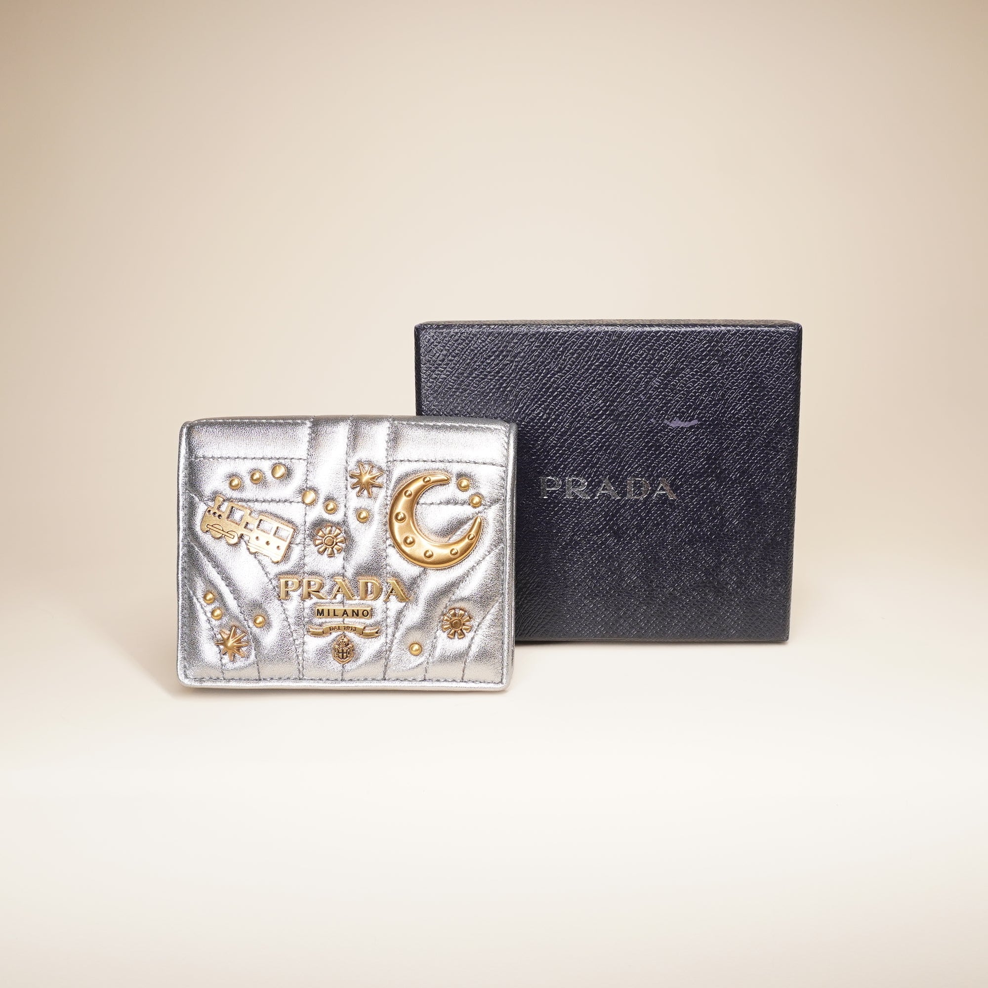 PRE-OWNED Silver Small Diagramme Embellished Quilted Wallet