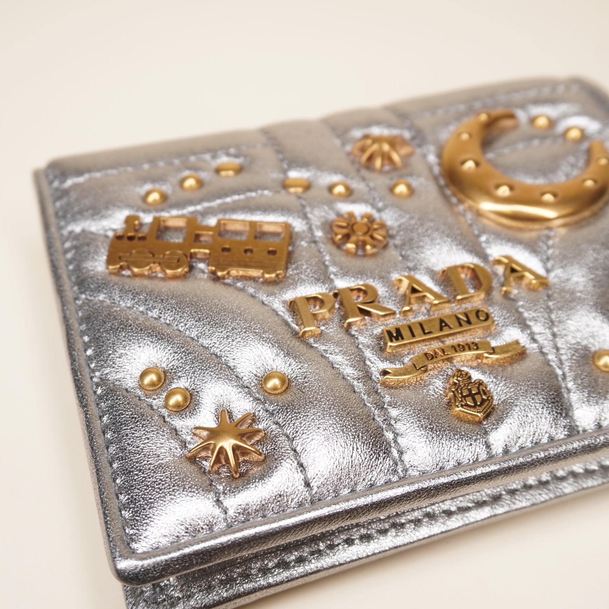 PRE-OWNED Silver Small Diagramme Embellished Quilted Wallet