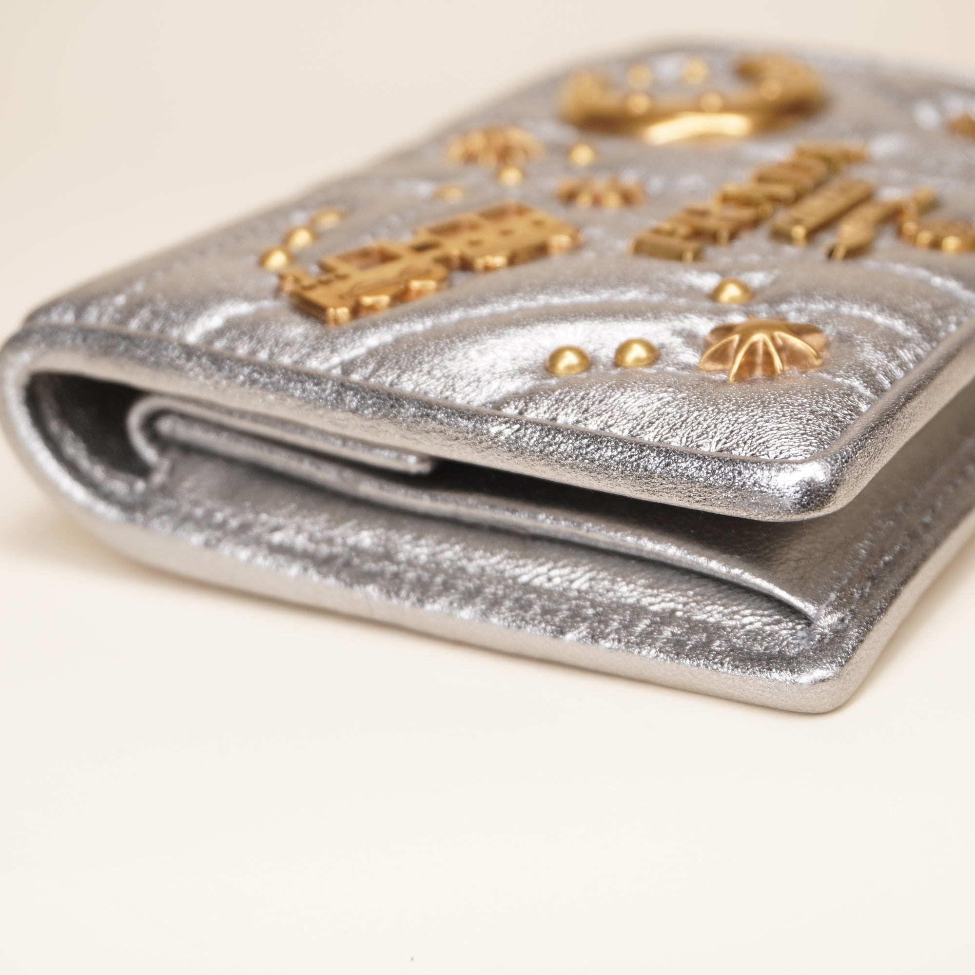 PRE-OWNED Silver Small Diagramme Embellished Quilted Wallet