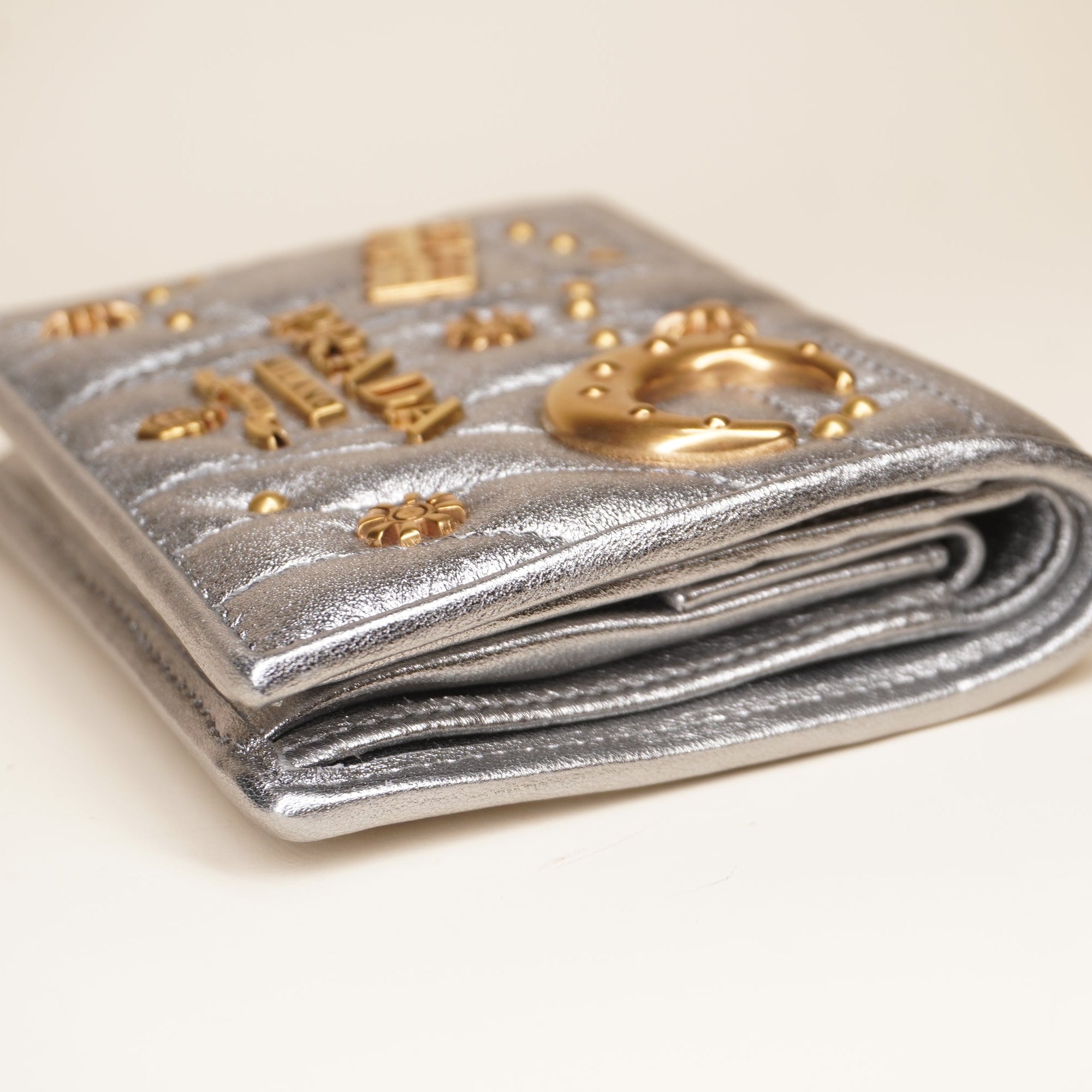 PRE-OWNED Silver Small Diagramme Embellished Quilted Wallet