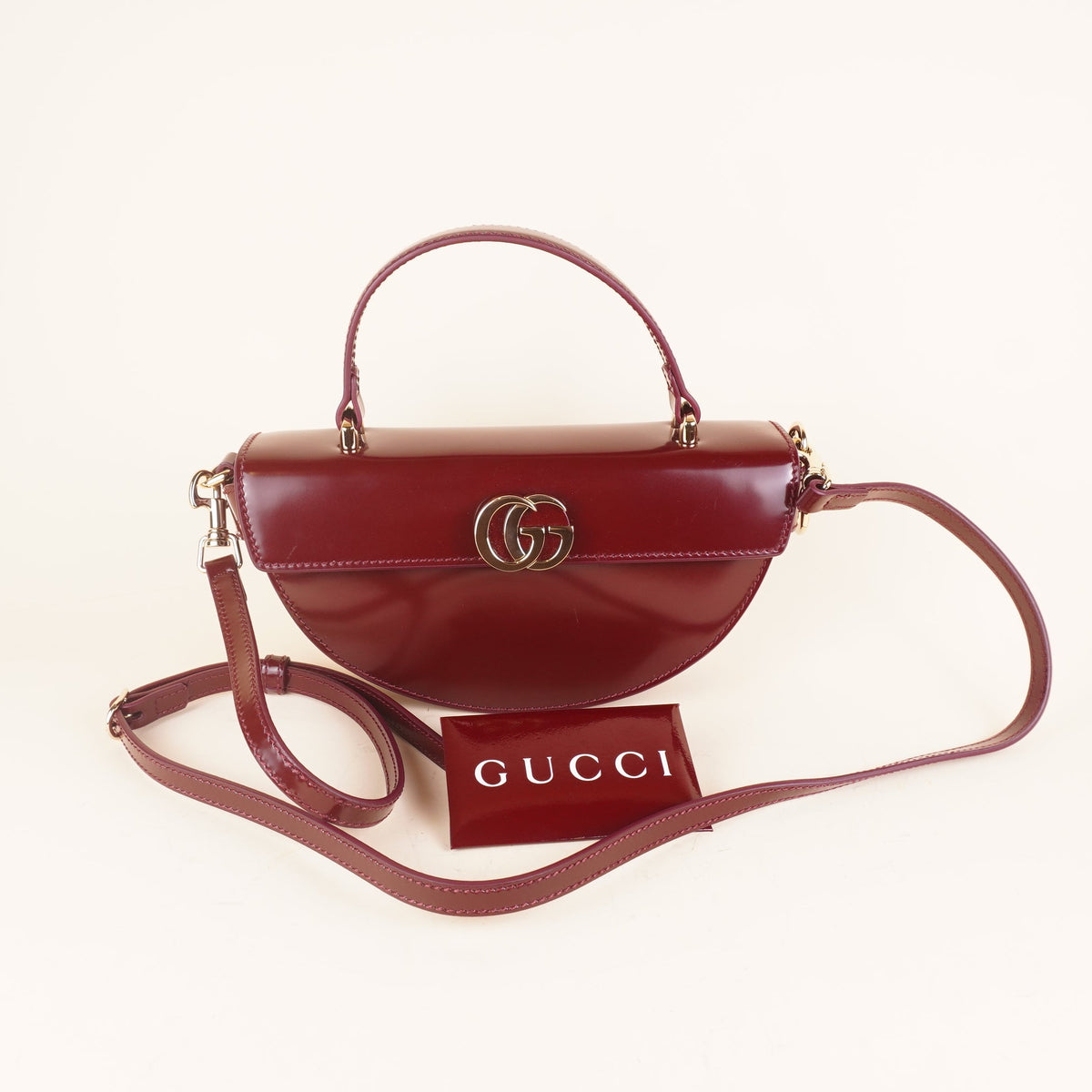 PRE-OWNED GG Interlocking G Half Moon Leather Crossbody Bag 