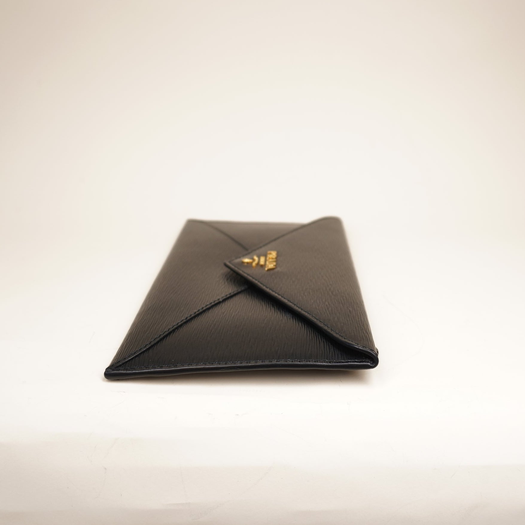 PRE-OWNED Black Vitello Move Envelope Clutch