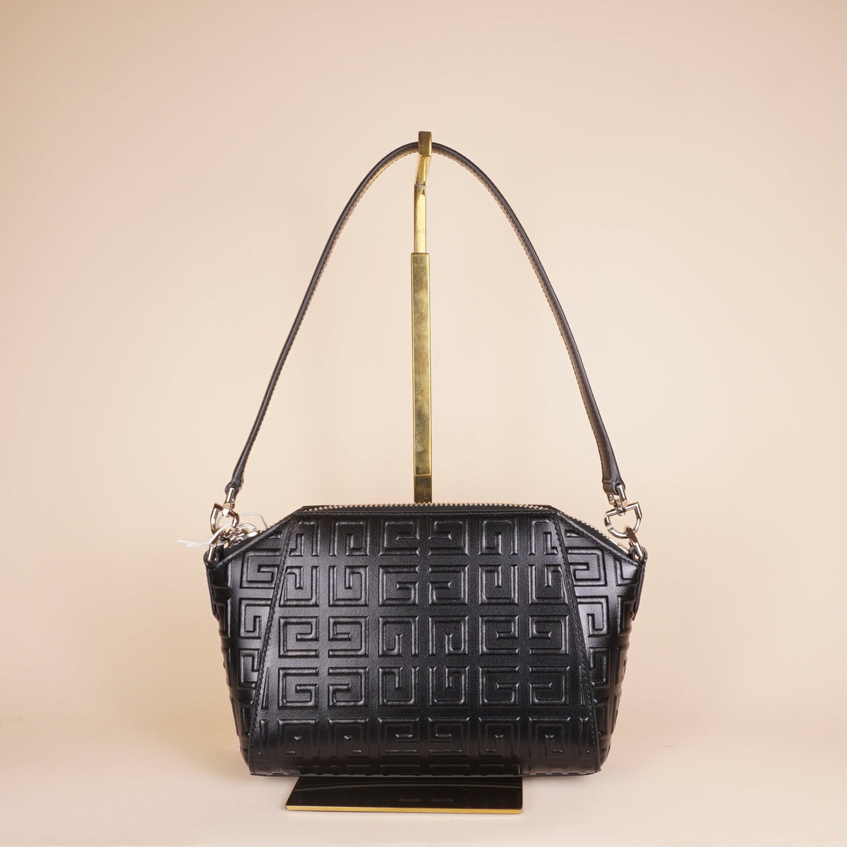 PRE-OWNED Black Calfskin Logo Embossed XS Antigona Shoulder Bag