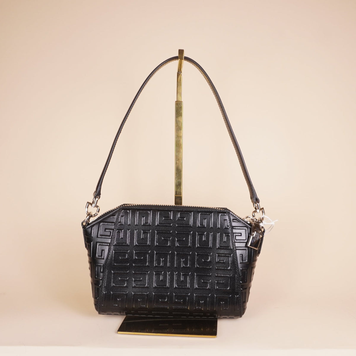 PRE-OWNED Black Calfskin Logo Embossed XS Antigona Shoulder Bag