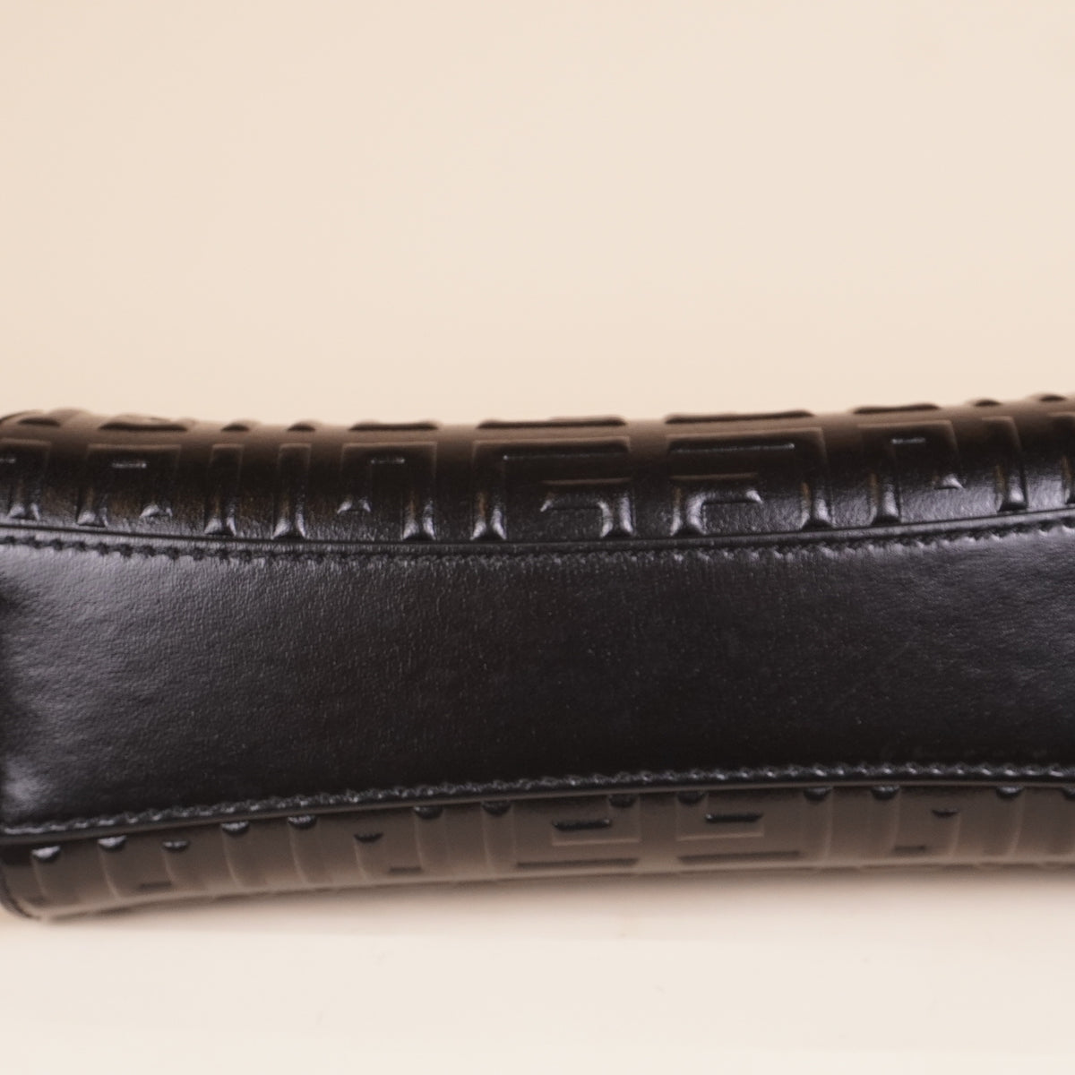 PRE-OWNED Black Calfskin Logo Embossed XS Antigona Shoulder Bag