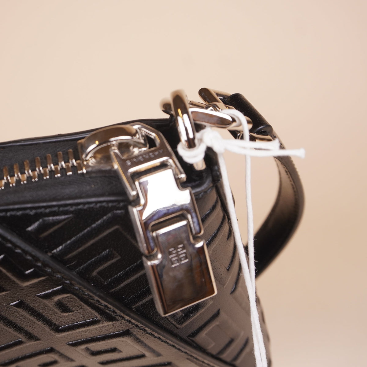 PRE-OWNED Black Calfskin Logo Embossed XS Antigona Shoulder Bag