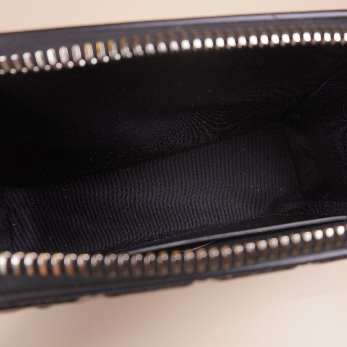 PRE-OWNED Black Calfskin Logo Embossed XS Antigona Shoulder Bag