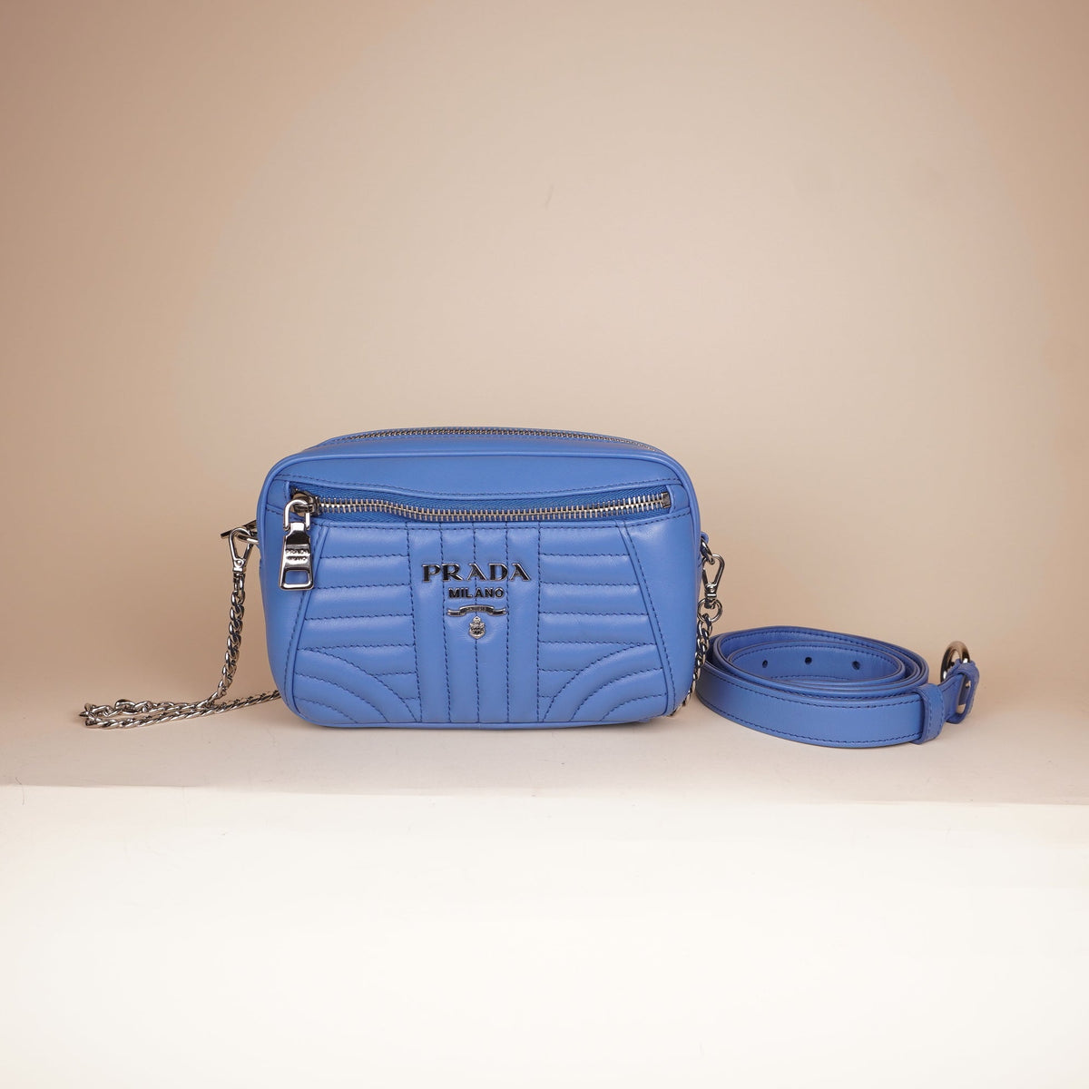 PRE-OWNED Blue Soft Calf Impunture Diagramme Camera Belt Bag and Crossbody Bag