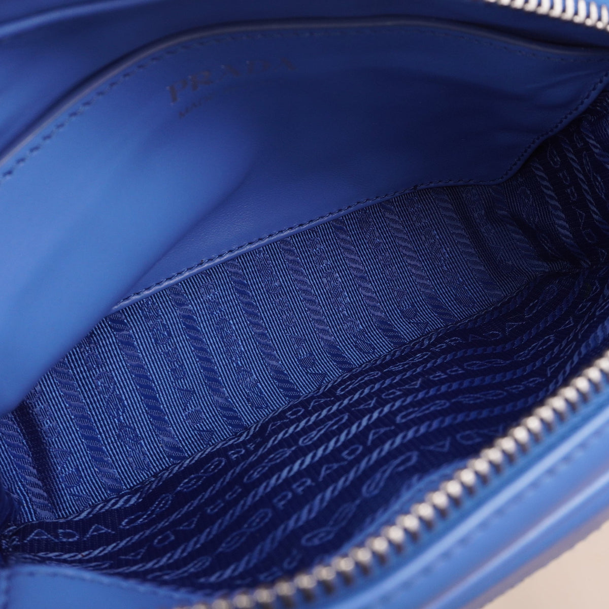 PRE-OWNED Blue Soft Calf Impunture Diagramme Camera Belt Bag and Crossbody Bag
