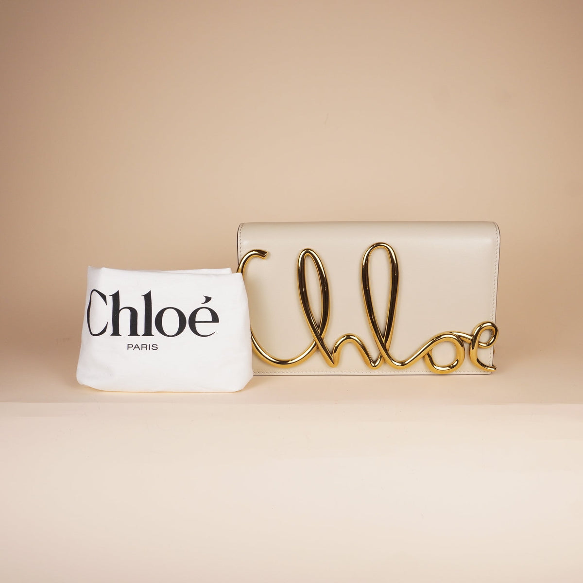 PRE-OWNED Neutral Iconic Clutch Crossbody Bag