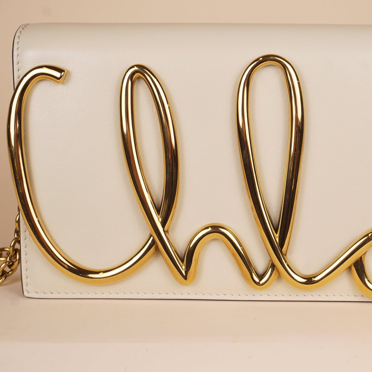 PRE-OWNED Neutral Iconic Clutch Crossbody Bag