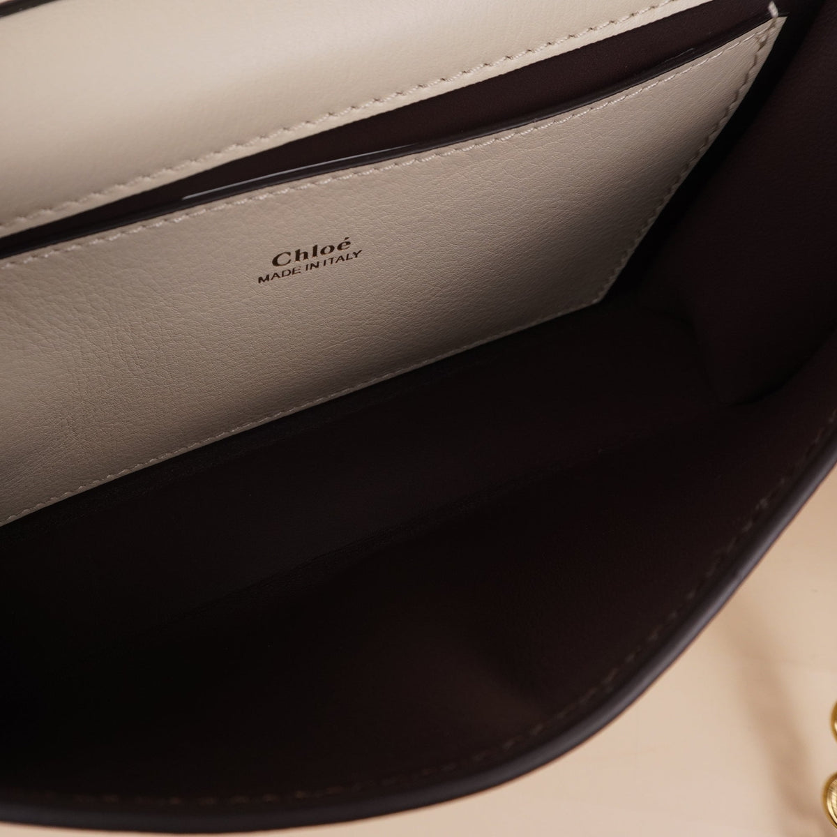 PRE-OWNED Neutral Iconic Clutch Crossbody Bag