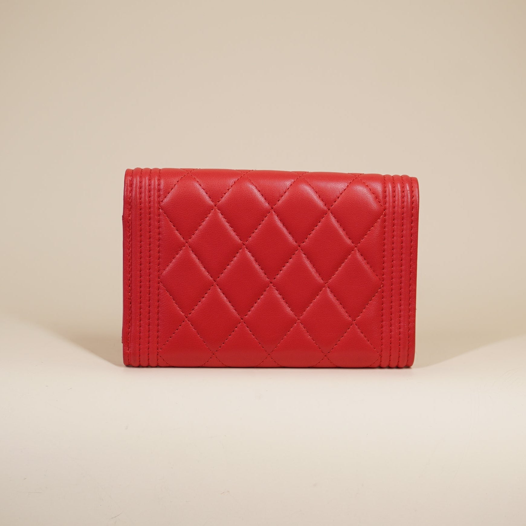 PRE-OWNED CC Watermelon Red Calfskin Boy Wallet