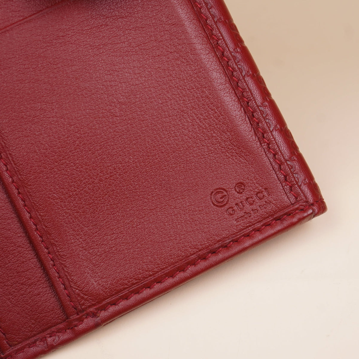 PRE-OWNED GG Red Microguccissima Leather Continental Folding Wallet