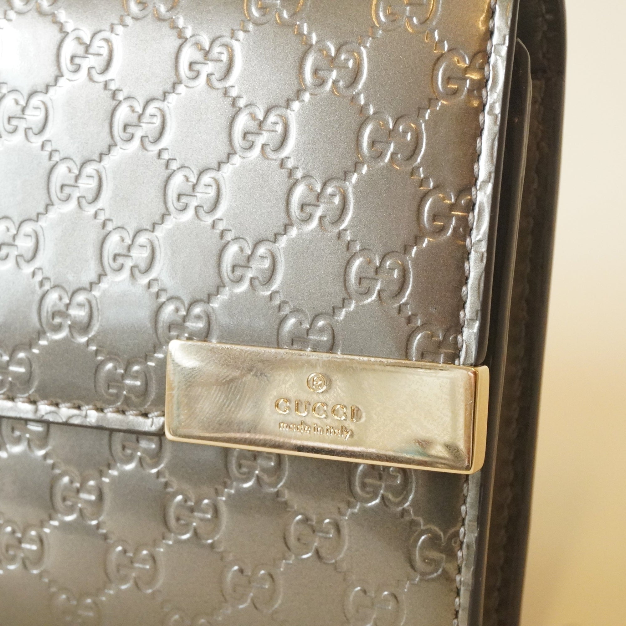 PRE-OWNED Metallic Grey Microguccissima Patent Leather Continental Wallet