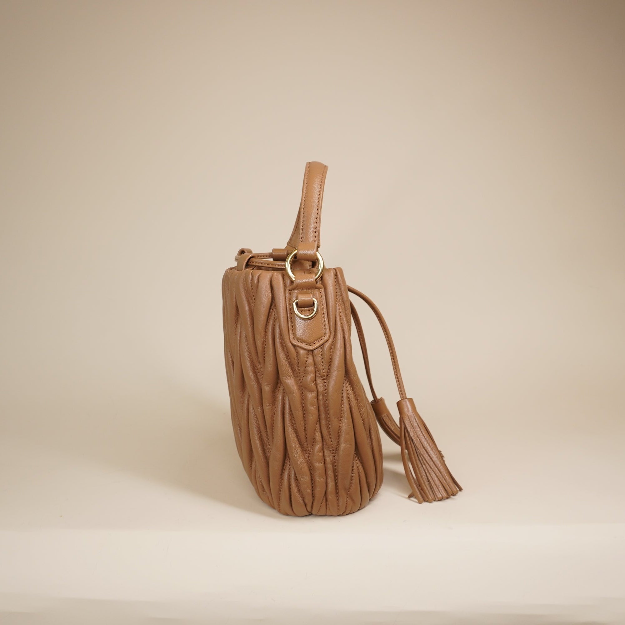 PRE-OWNED Brown Nappa Matelassé Leather Bucket Shoulder Bag