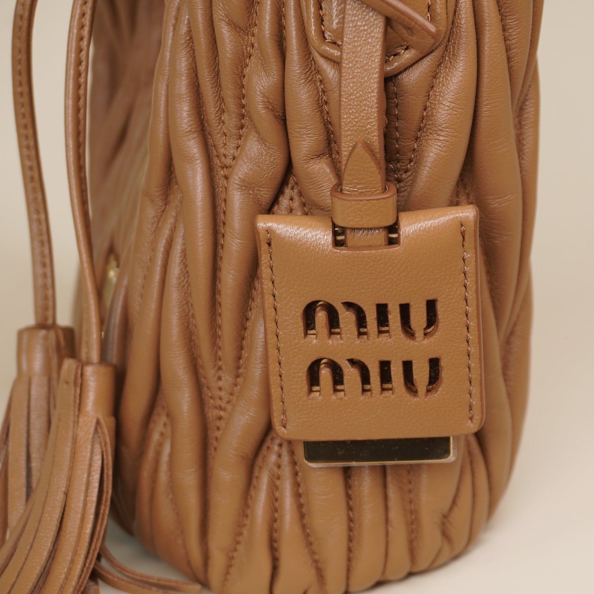 PRE-OWNED Brown Nappa Matelassé Leather Bucket Shoulder Bag