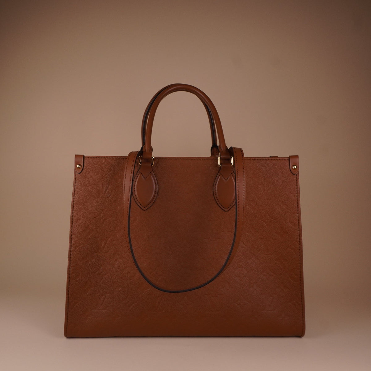 PRE-OWNED LV Empreinte Monogram OnTheGo MM Shoulder Bag