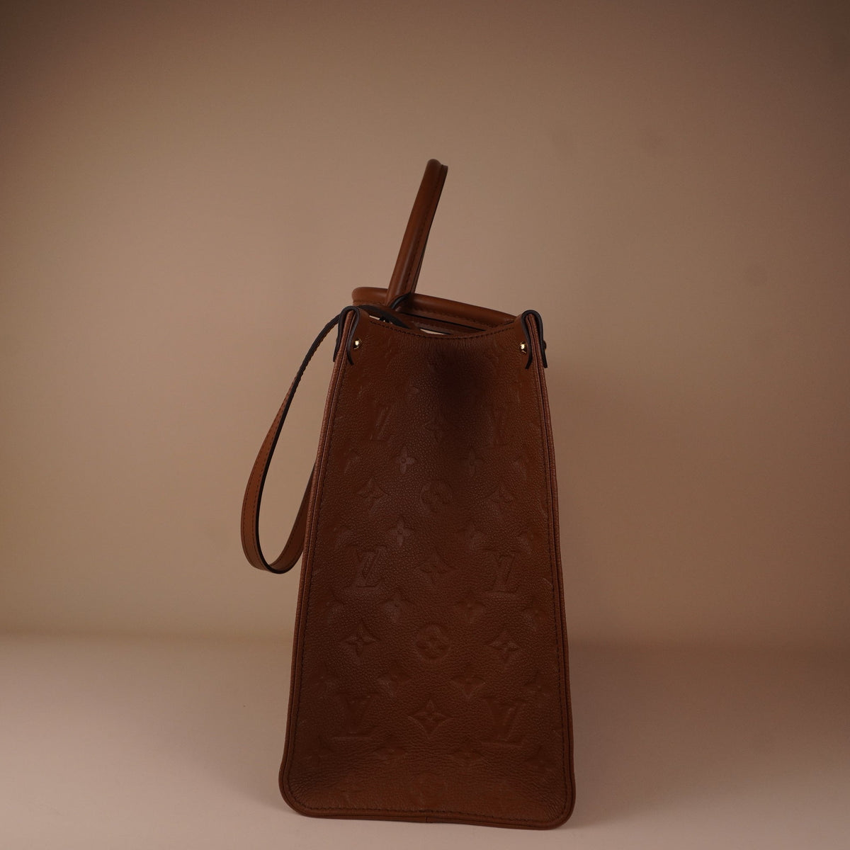 PRE-OWNED LV Empreinte Monogram OnTheGo MM Shoulder Bag