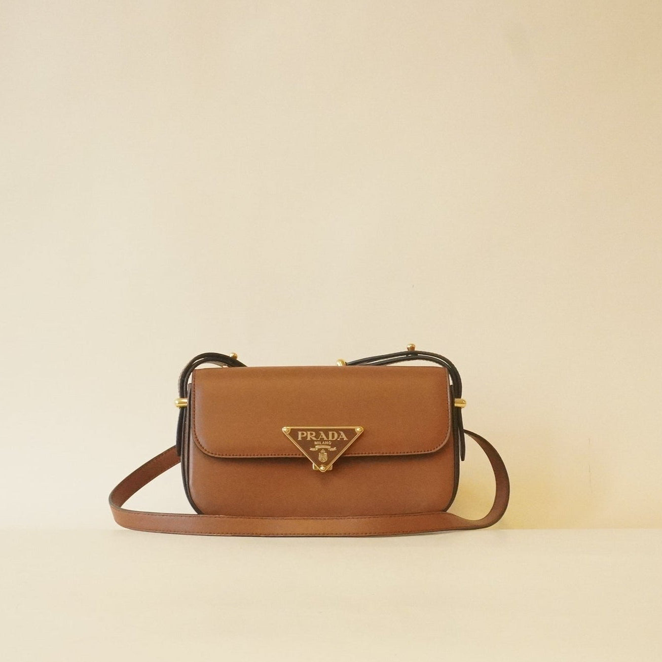 PRE-OWNED  Soft Calfskin Metal Triangle Logo Flap Shoulder Bag Cognac