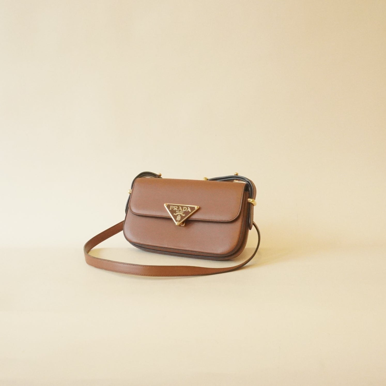 PRE-OWNED  Soft Calfskin Metal Triangle Logo Flap Shoulder Bag Cognac