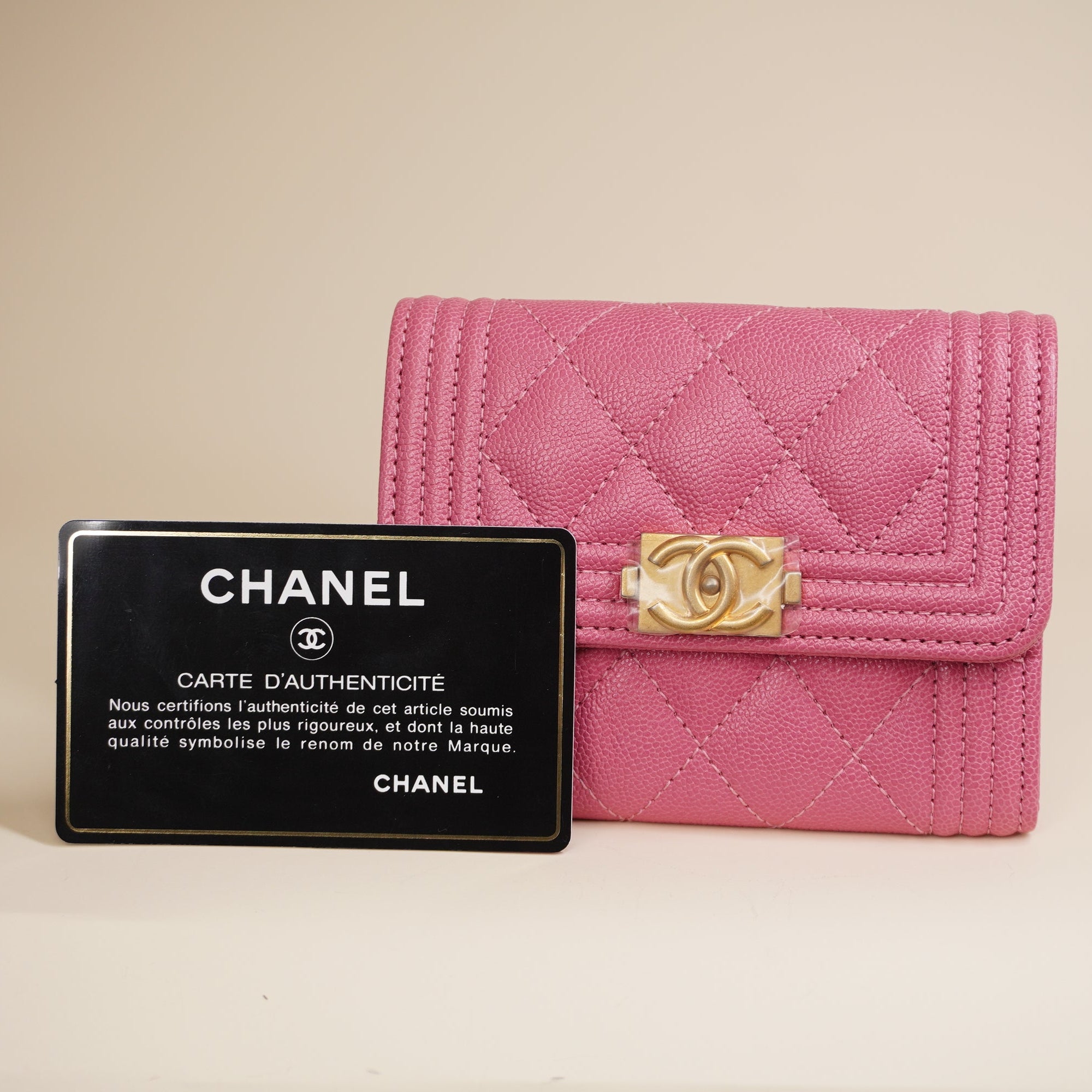 PRE-OWNED CC Pink Boy Compact Tri-Fold Wallet