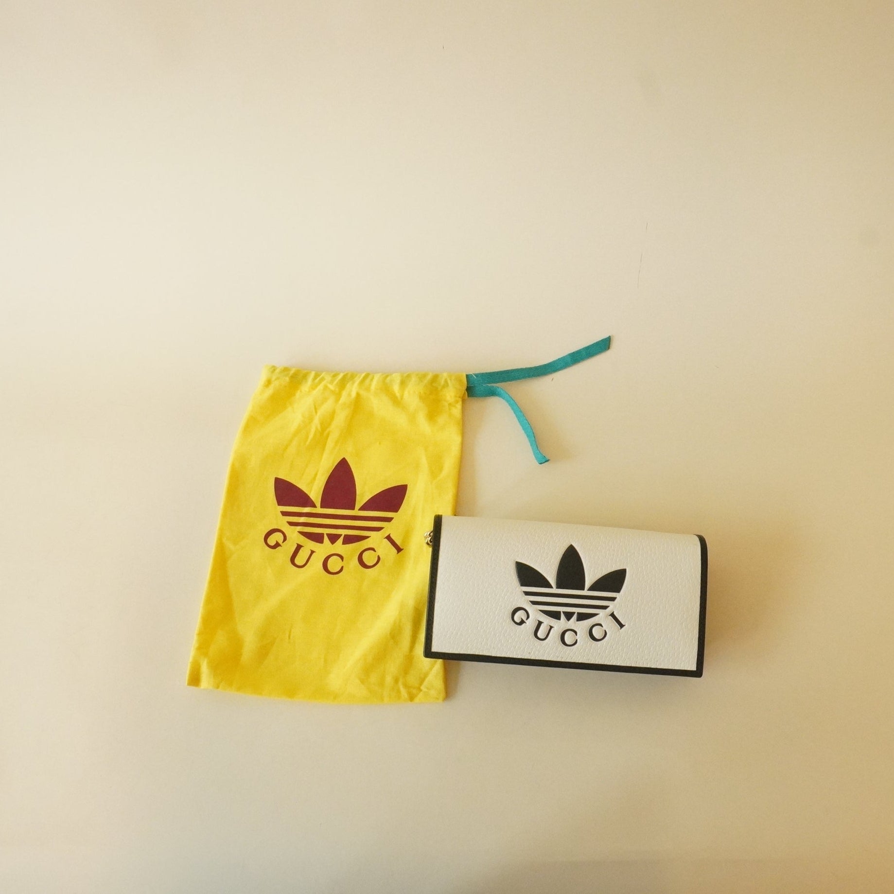 PRE-OWNED X ADIDAS Textured Dollar Calfskin Trefoil Embossed Wallet On Chain Off White Black
