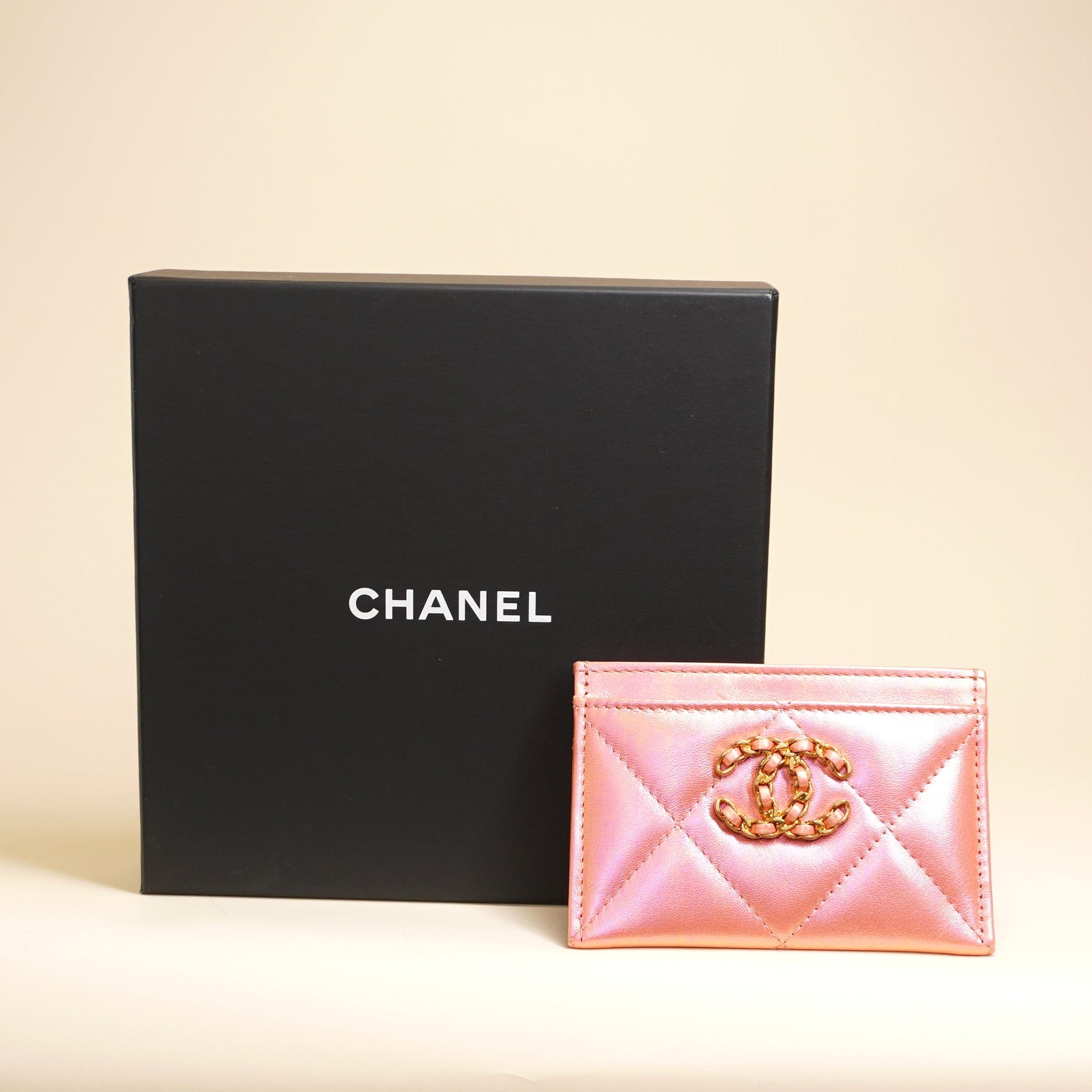 PRE-OWNED CC Pink Iridescent Calfskin Quilted Chanel 19 Card Holder
