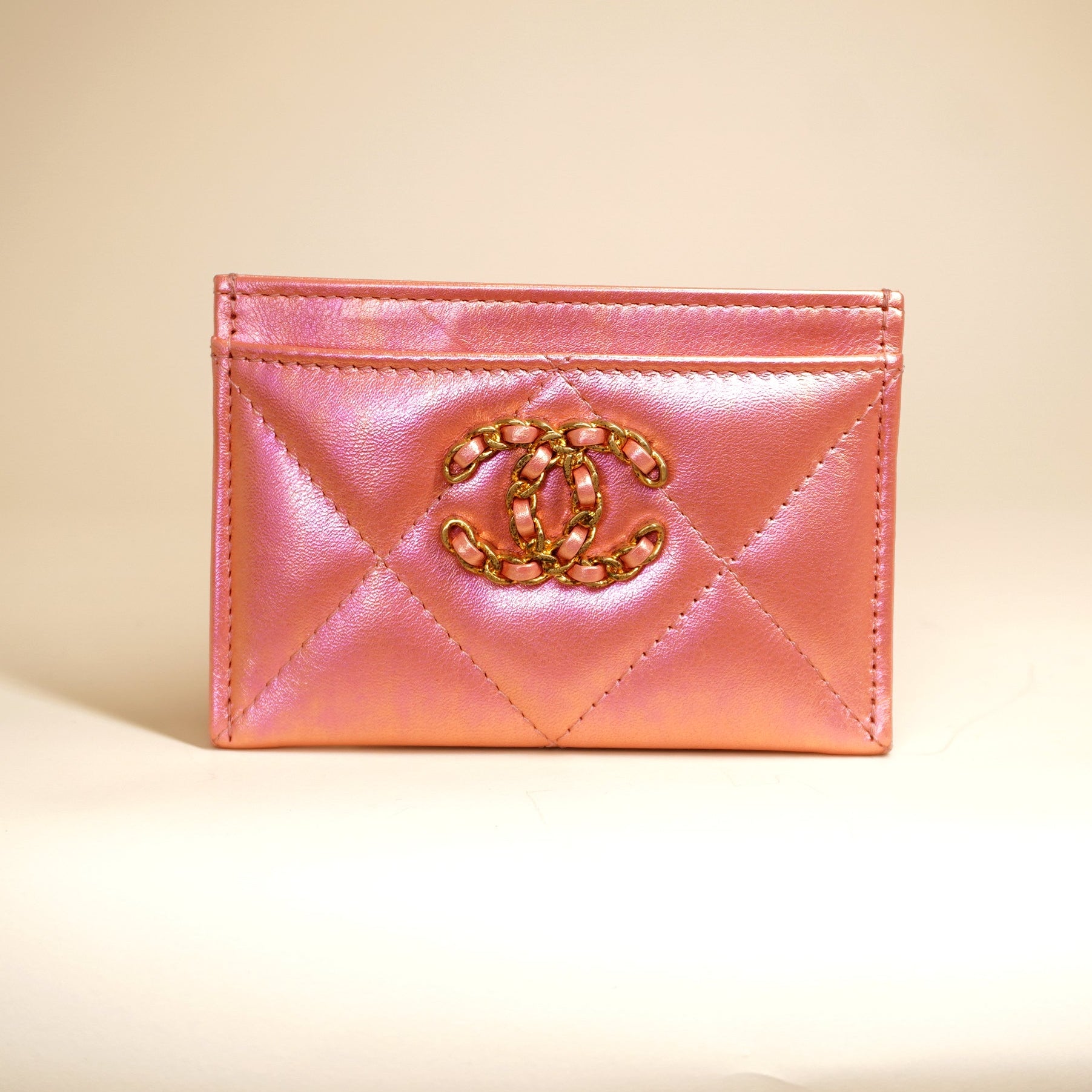 PRE-OWNED CC Pink Iridescent Calfskin Quilted Chanel 19 Card Holder