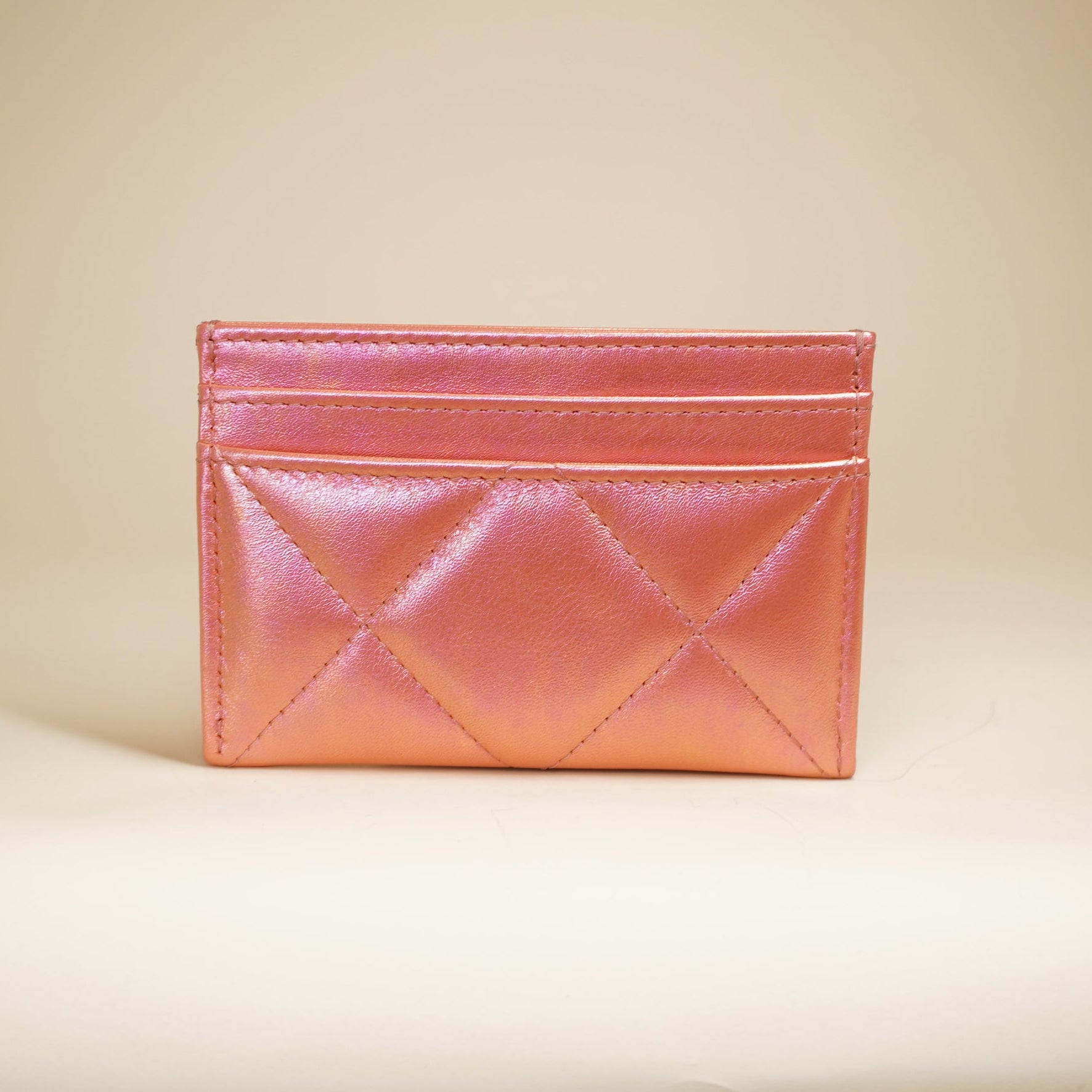 PRE-OWNED CC Pink Iridescent Calfskin Quilted Chanel 19 Card Holder