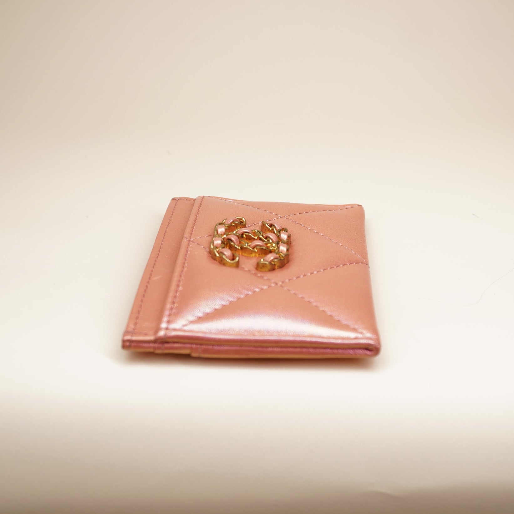PRE-OWNED CC Pink Iridescent Calfskin Quilted Chanel 19 Card Holder