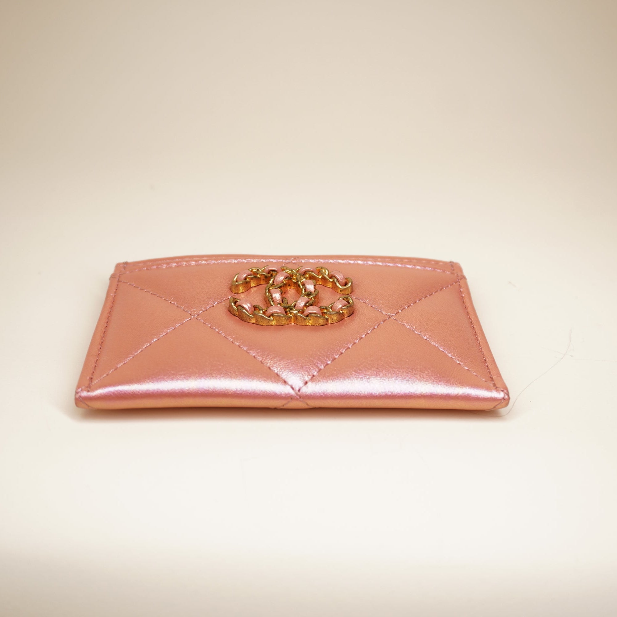PRE-OWNED CC Pink Iridescent Calfskin Quilted Chanel 19 Card Holder