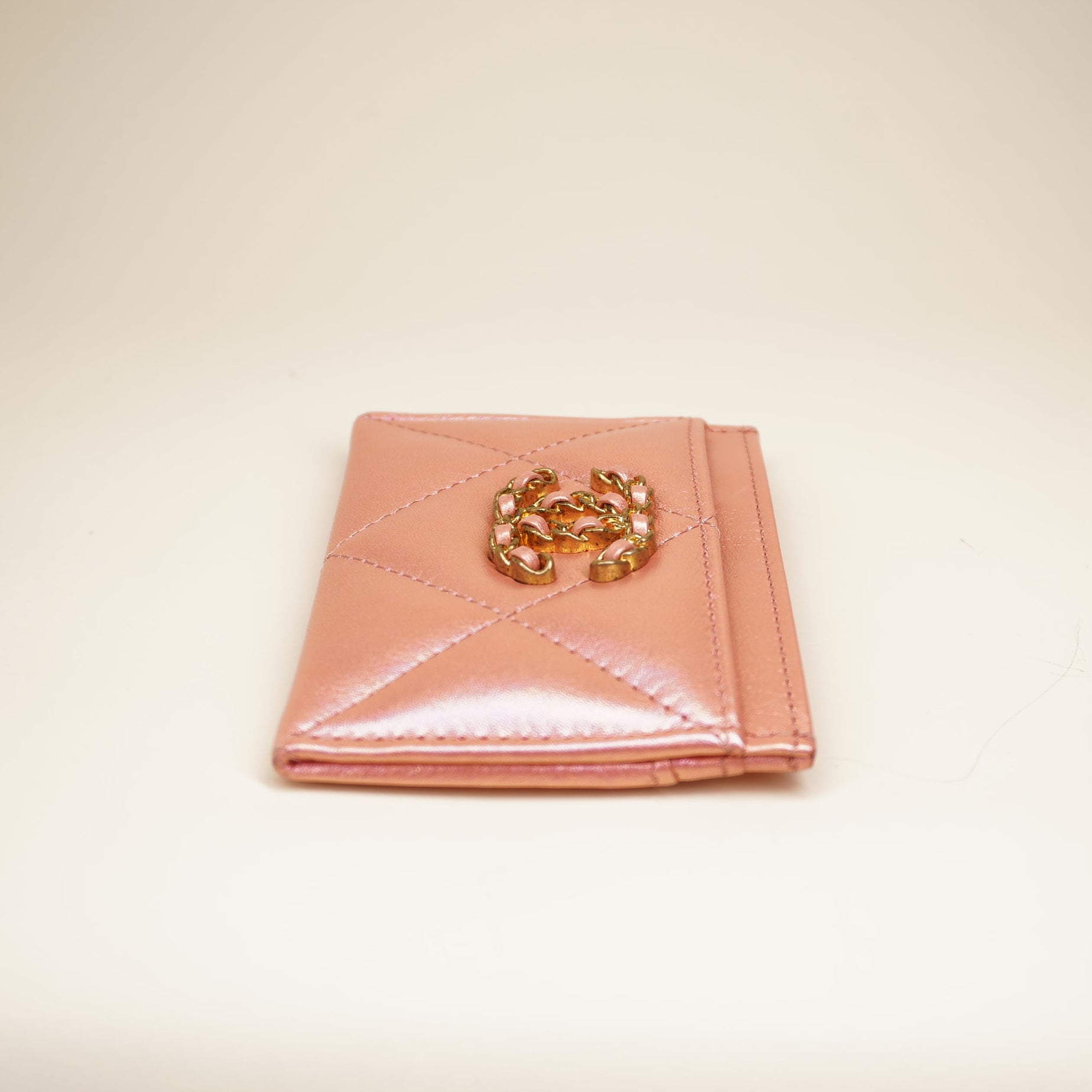 PRE-OWNED CC Pink Iridescent Calfskin Quilted Chanel 19 Card Holder